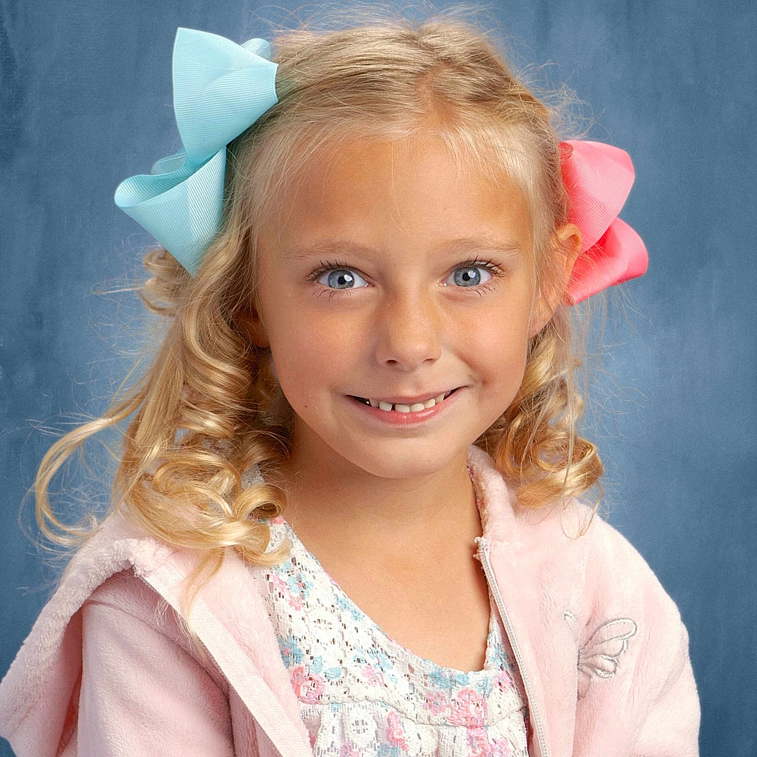 Scarlett is registered to the contest to win money with this photo: accessories, blonde, bodypart, child, clothing, coat, dress, face, female, formalwear, girl, hair, happy, head, headband, person, photography, portrait, shoulder, smile
