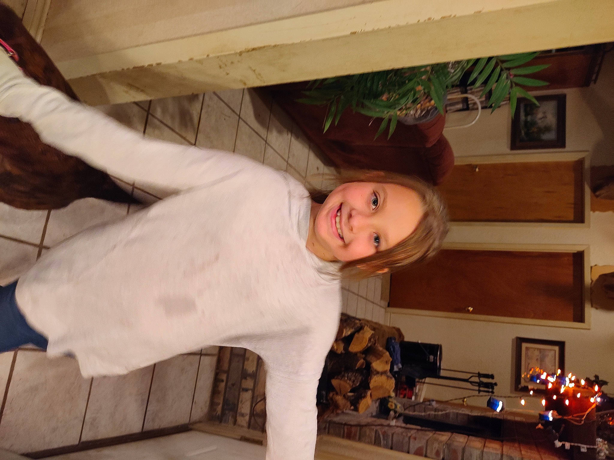 Lacie joined the competition — help win amazing prizes! child, event, flooring, fun, fur, holiday, house, joy, person, picture_frame, room, shelf, sitting, smile, toddler, under_exposed, wood