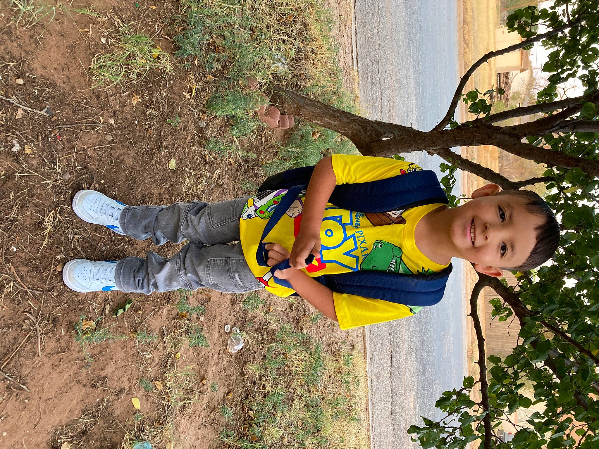 Josiah is registered to the contest to win money with this photo: baby_toddler_clothing, child, fun, grass, happy, joy, leisure, people_in_nature, person, plant, play, smile, soil, toddler, tree, walking_shoe