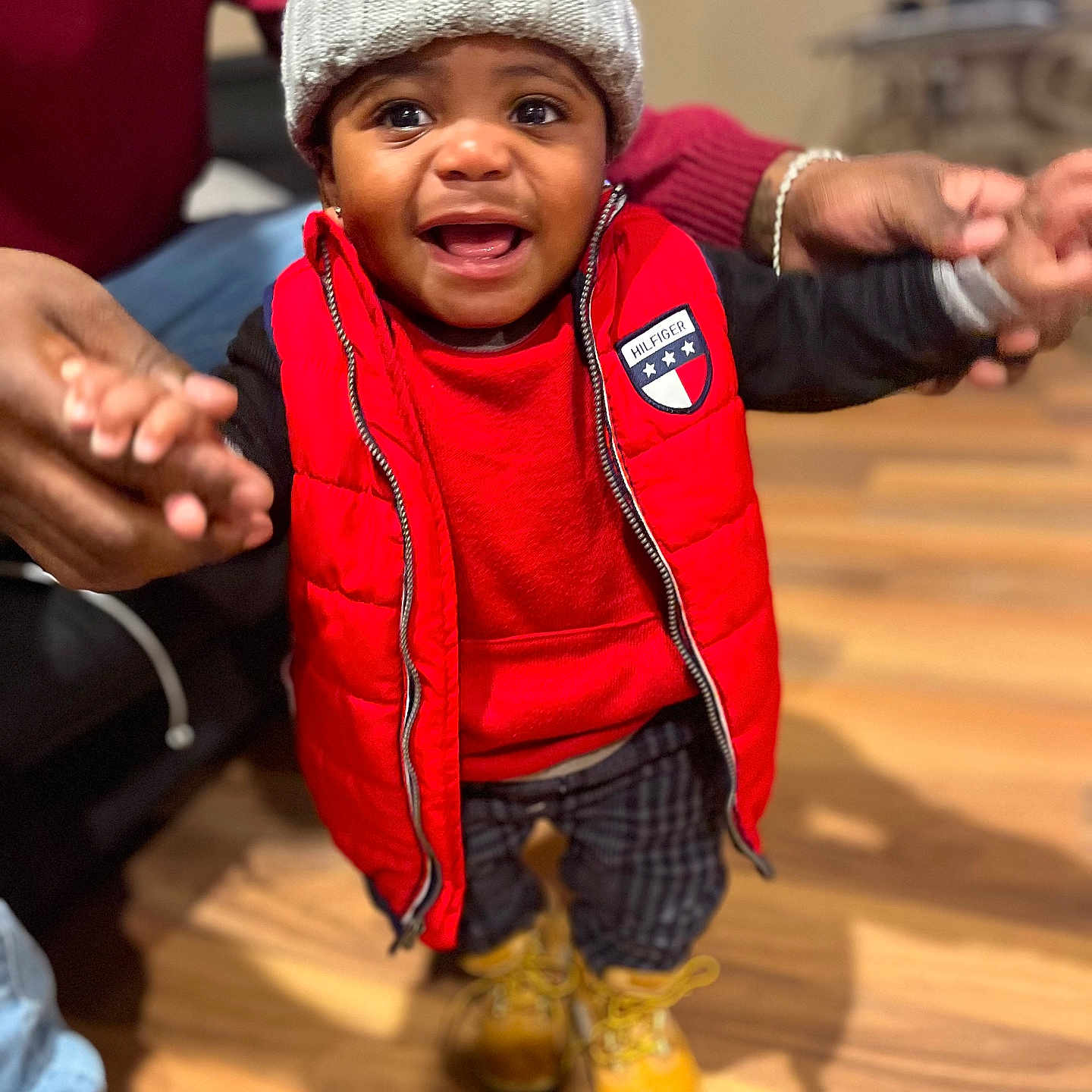 Kyuri is registered to the contest to win money with this photo: bodypart, boy, cap, child, clothing, coat, face, finger, footwear, hand, hardwood, hat, head, jacket, male, person, photography, portrait, shoe, wood