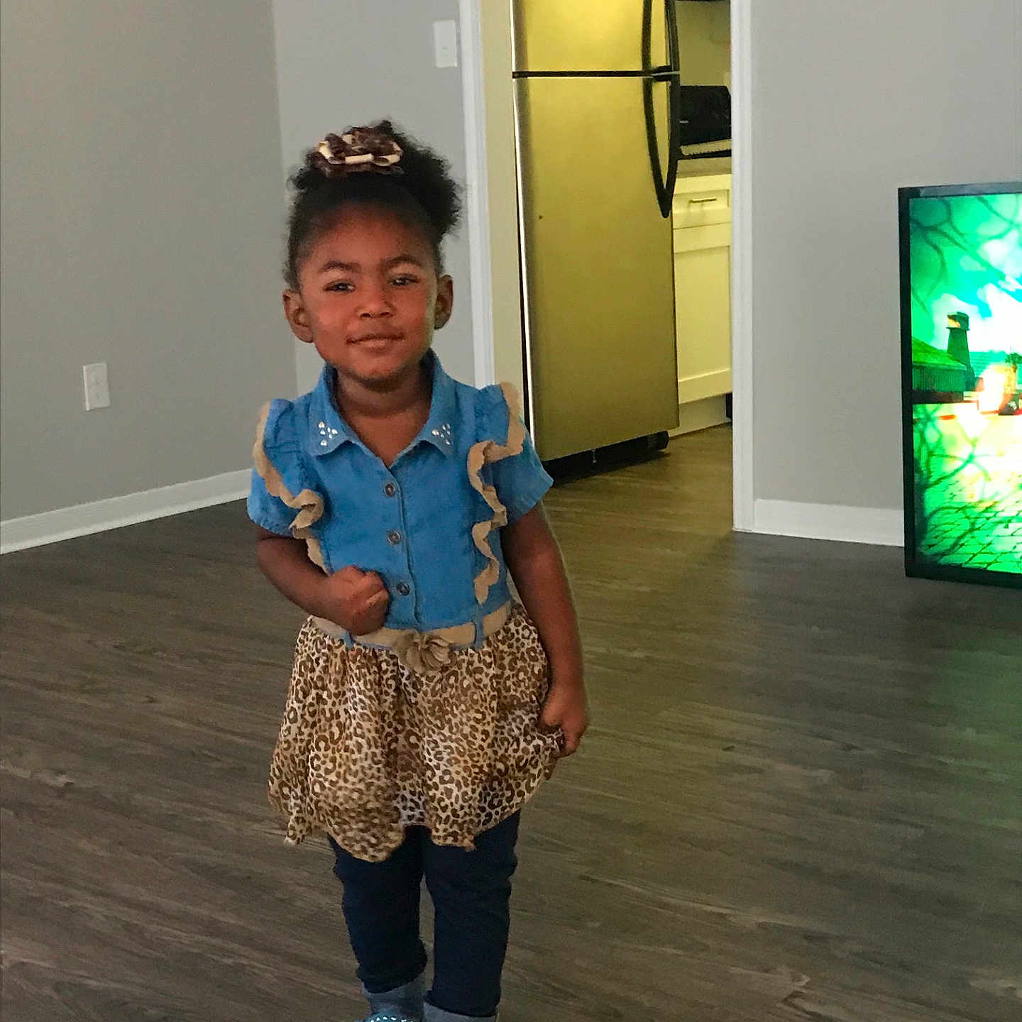 Peyton is registered to the contest to win money with this photo: arm, blue, floor, flooring, fun, product, recreation, space