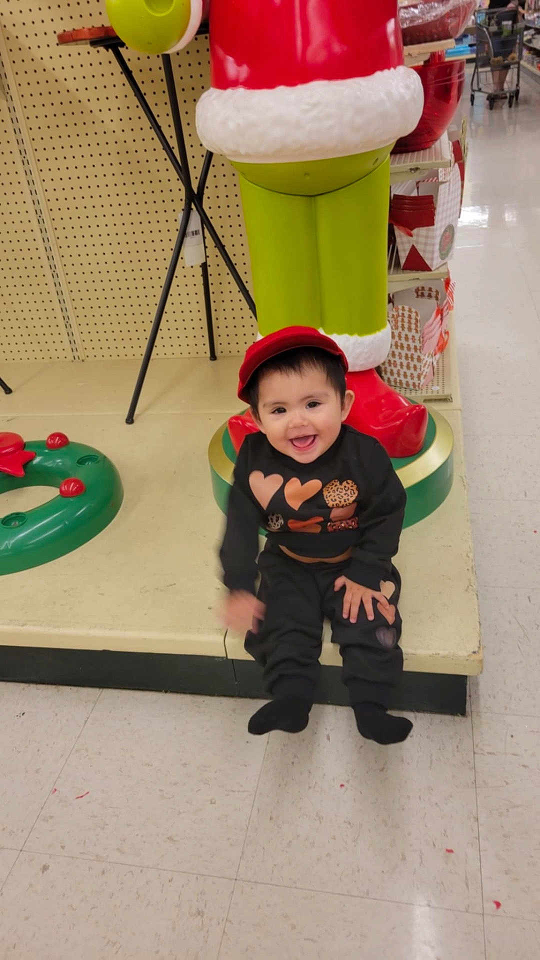 Carolina is registered to the contest to win money with this photo: baby, baseballcap, cap, clothing, coat, face, footwear, hat, head, hosiery, indoors, interiordesign, jacket, lighting, pants, person, photography, portrait, shoe, sock