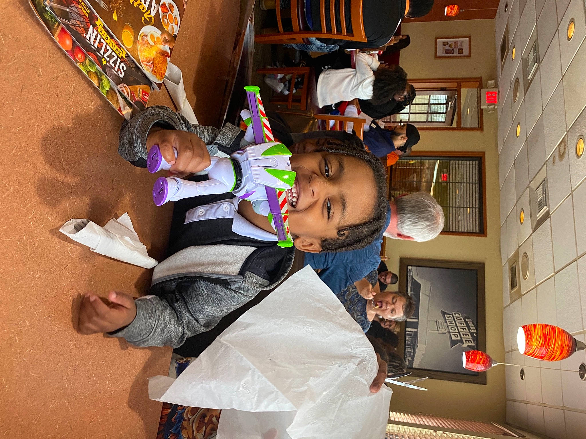 Jakai joined the competition — help win amazing prizes! black_hair, child, costume, event, eyewear, fun, happy, leisure, person, play, room, sitting, surprise, toddler, transport, travel, under_exposed