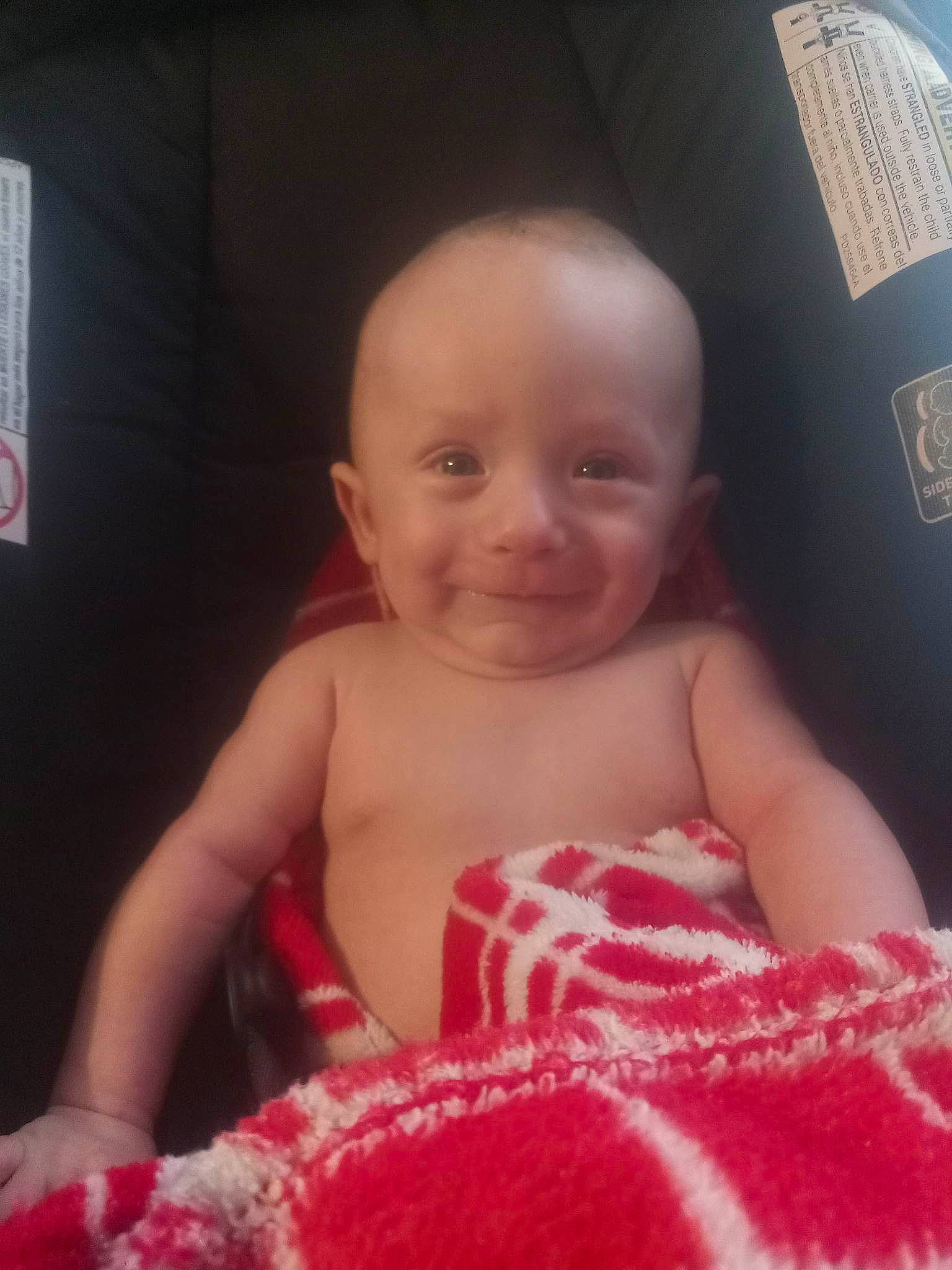 Jimmy is registered to the contest to win money with this photo: baby, baby_toddler_clothing, cheek, chest, eye, eyebrow, finger, fun, happy, head, iris, joy, lip, mouth, nose, organ, person, pink, skin, smile