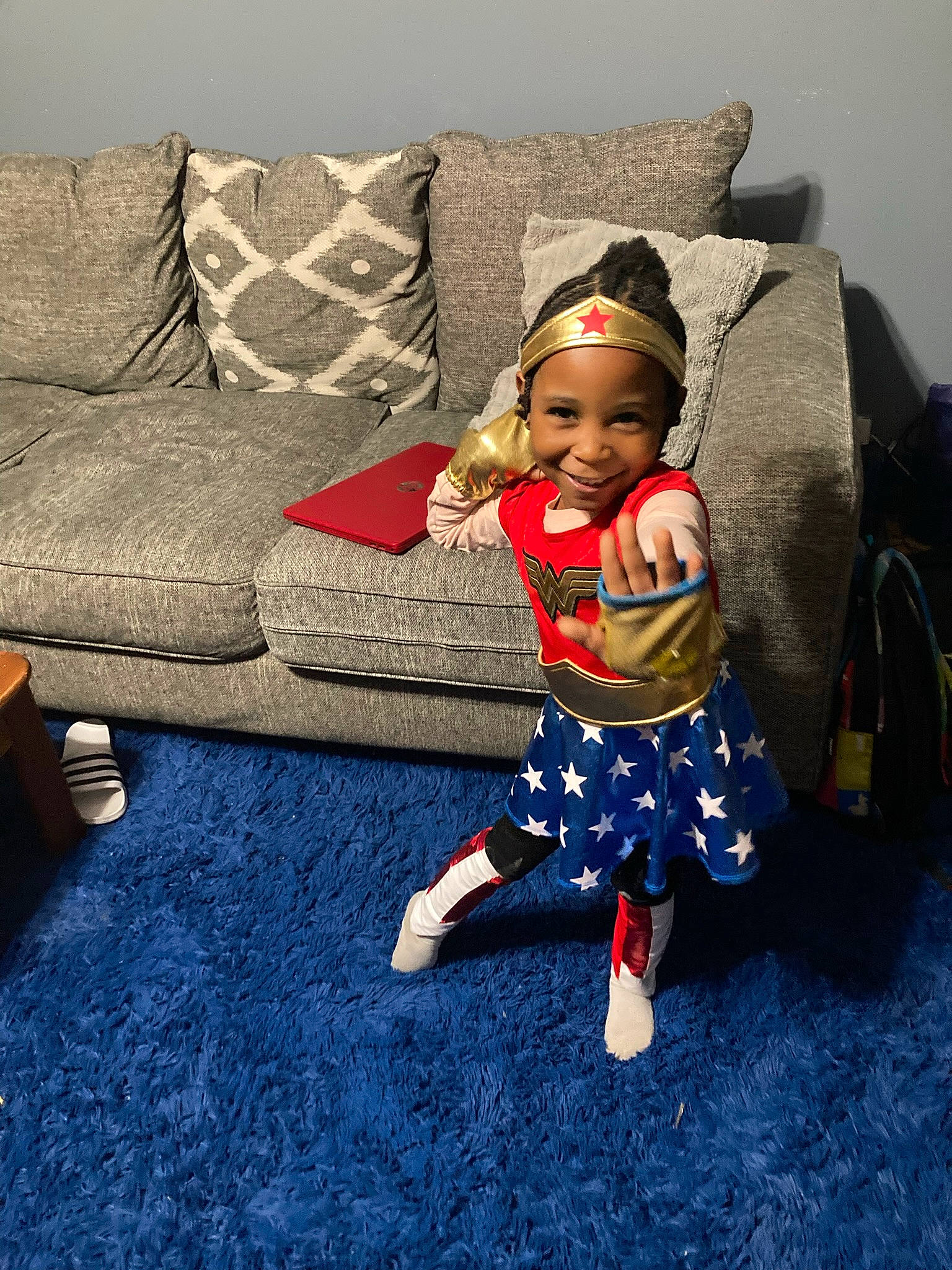 Cassidy joined the competition — help win amazing prizes! baby, baby_toddler_clothing, child, comfort, costume_hat, couch, electric_blue, event, floor, flooring, fun, hairstyle, happy, headwear, human_body, joy, leisure, living_room, person, sitting