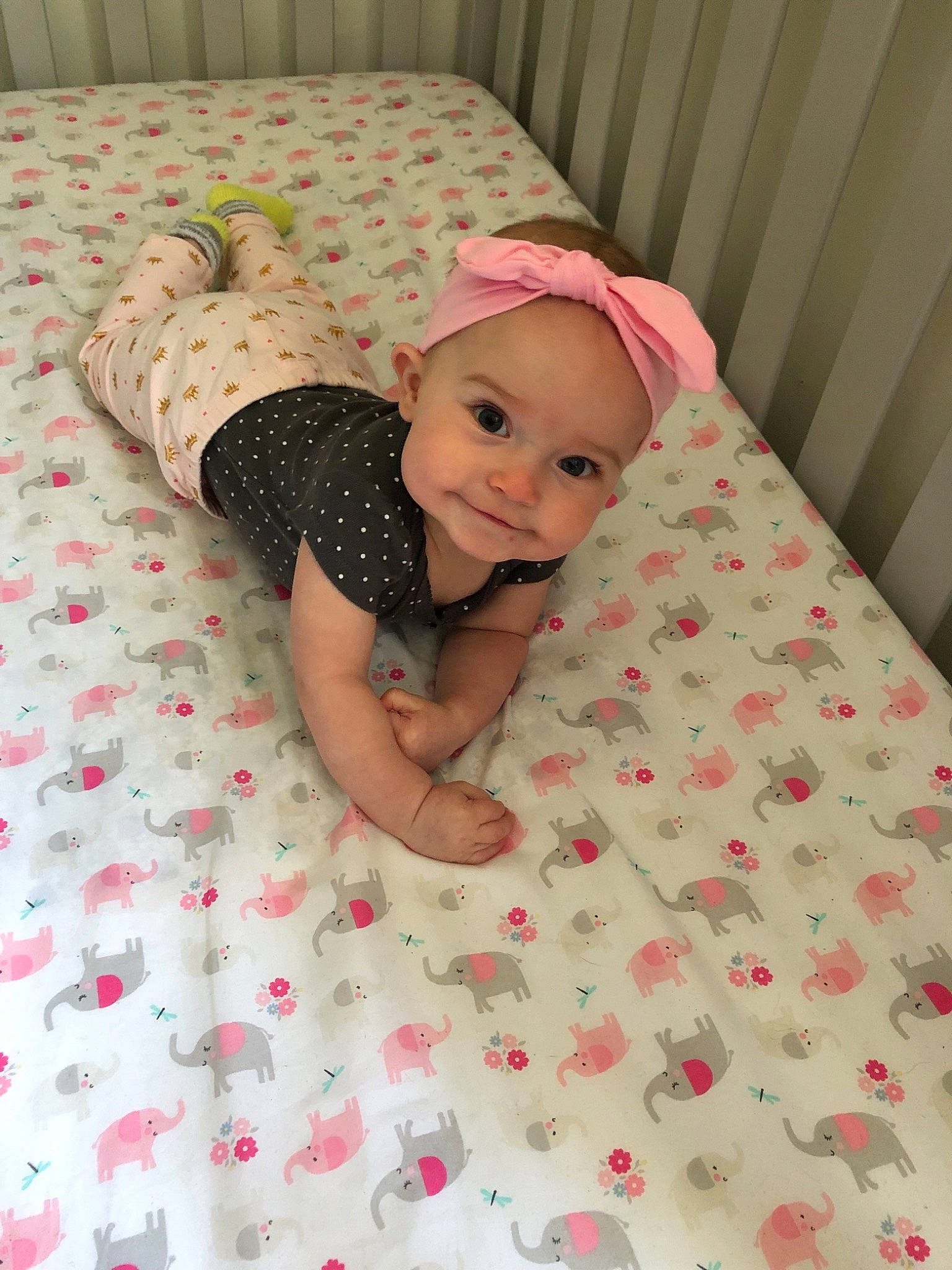 Melaina is registered to the contest to win money with this photo: baby, bedding, bedtime, blanket, child, linens, nap_mat, pattern, person, pink, skin, textile, toddler