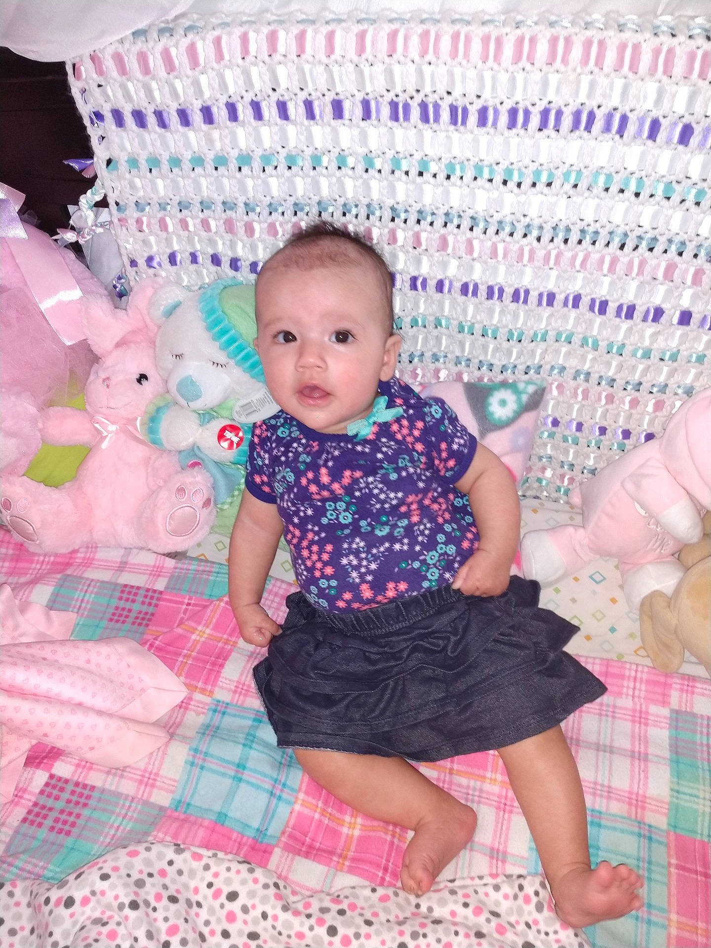 Stephanie is registered to the contest to win money with this photo: cheek, child, day, design, fun, girl, infant, iris, material, pattern, person, pink, plaid, polka_dot, product, skin, smile, textile, toddler