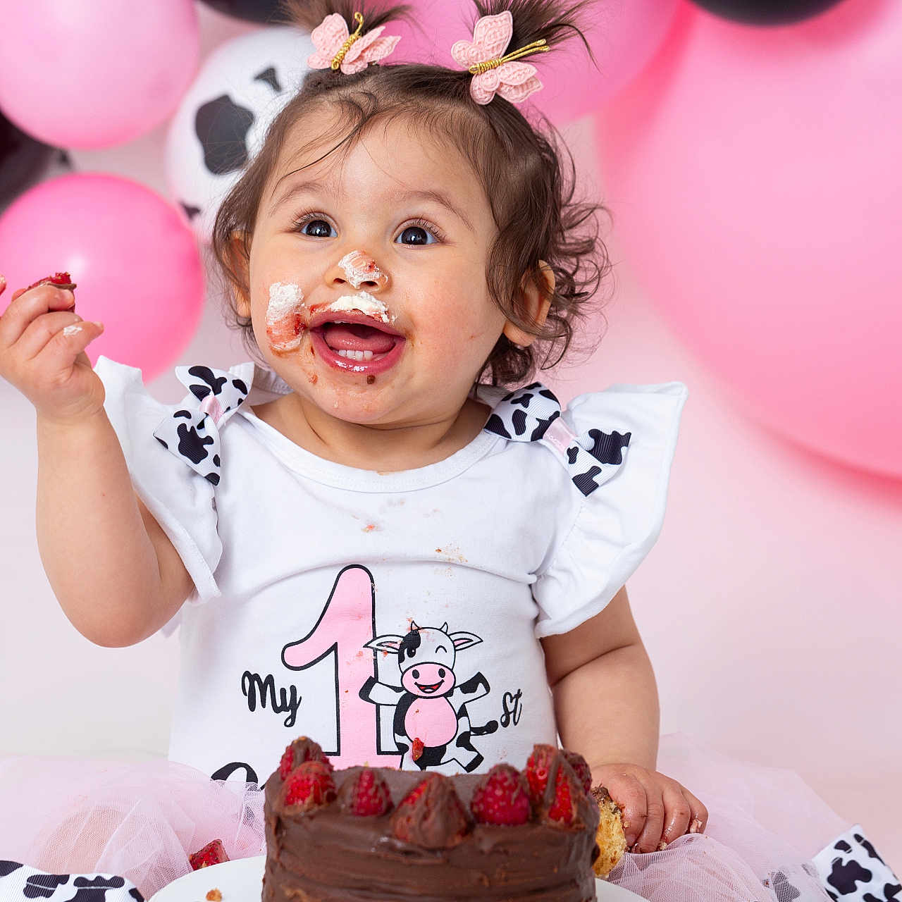 Sophia joined the competition — help win amazing prizes! baby, balloons, birthday, cake, celebration, child, chocolate_cake, cute, dress, face_paint, first_birthday, food, hair_accessory, happy, party, pink, smiling, strawberry, tutu, young_child