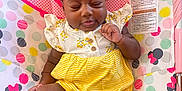 Kaycee is registered to the contest to win money with this photo: baby, infant, child, sleeping, cute, mickey_mouse, minnie_mouse, baby_seat, colorful, yellow_clothing, polka_dots, heart_shapes, wooden_floor, indoors, comfortable, peaceful, smiling, small_hands, soft_fabric, casual