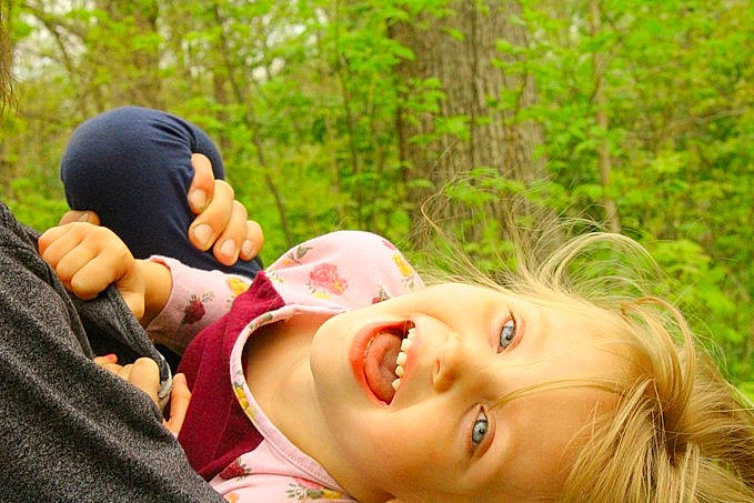 Emberlynn joined the competition — help win amazing prizes! child, forest, fun, gesture, grass, happy, jungle, laugh, leisure, people_in_nature, person, plant, portrait_photography, recreation, smile, terrestrial_plant, toddler, tree, vacation, woodland