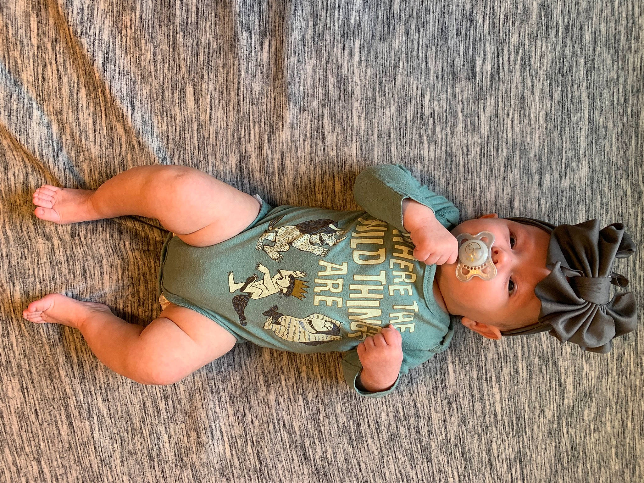 Isabella is registered to the contest to win money with this photo: baby, baby_toddler_clothing, child, doll, eye, fawn, finger, foot, glasses, grass, hat, headwear, joint, leg, person, shoe, skin, thigh, toddler, toy