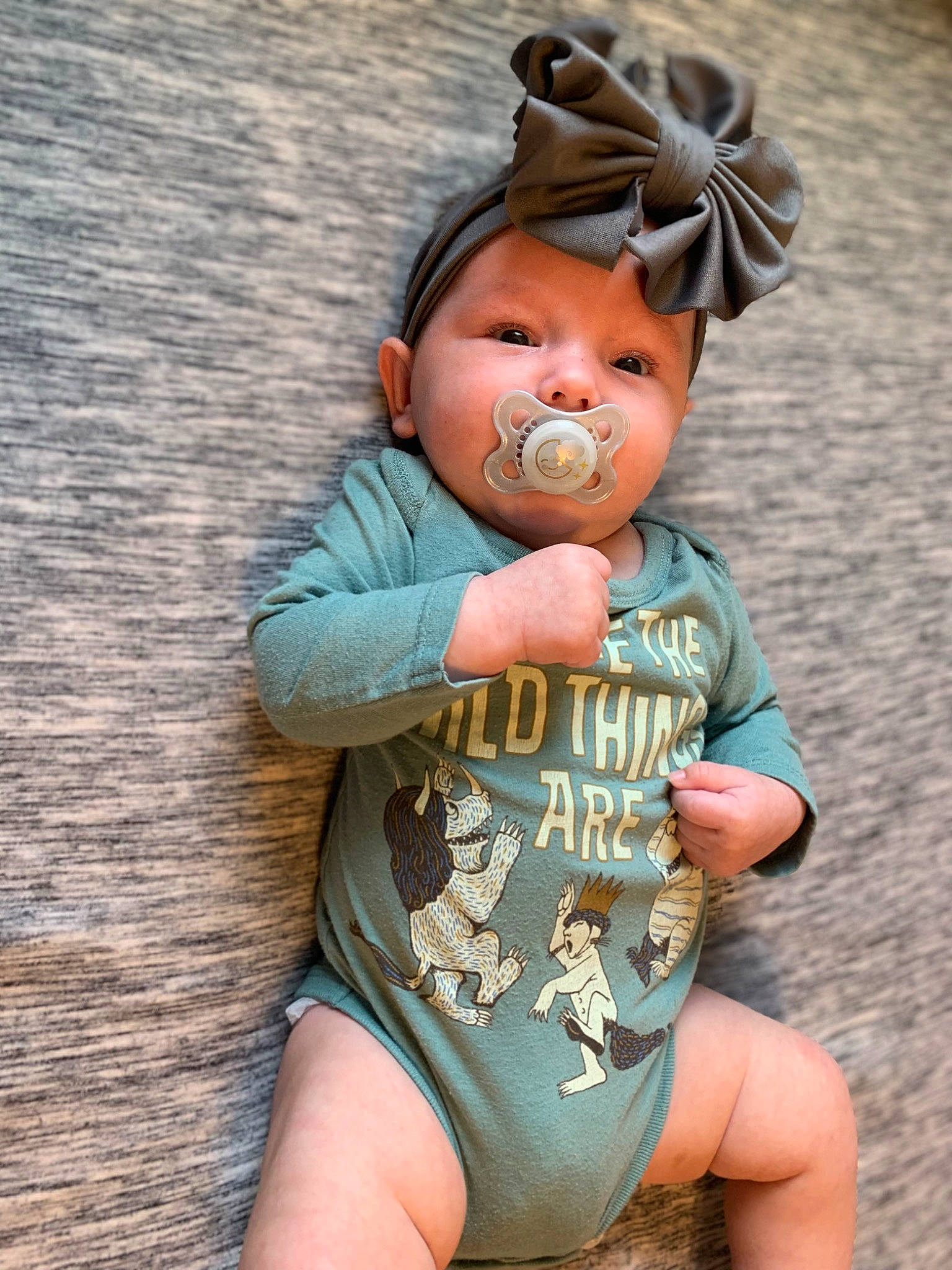 Isabella is registered to the contest to win money with this photo: arm, baby_toddler_clothing, chest, cool, doll, fawn, finger, gesture, hand, happy, joint, person, skin, sleeve, textile, thigh, toy, trunk, vertebrate, waist