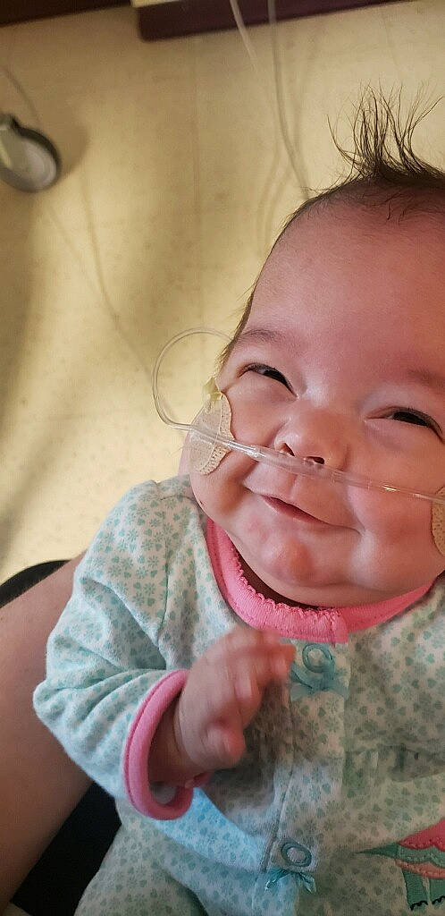 Helen Marie Klingsmith is registered to the contest to win money with this photo: baby, cheek, child, chin, close_up, ear, eye, face, facial_expression, finger, forehead, head, lip, mouth, nose, person, skin, smile, thumb, toddler