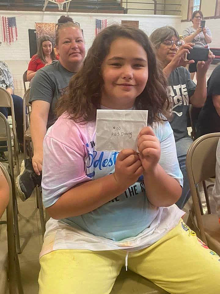 Sophia Reagan Persell is registered to the contest to win money with this photo: arm, bag, blurred, chair, fashion, hair, hand, happy, human, joint, joy, leisure, luggage_and_bags, organ, person, product, shorts, shoulder, smile, summer