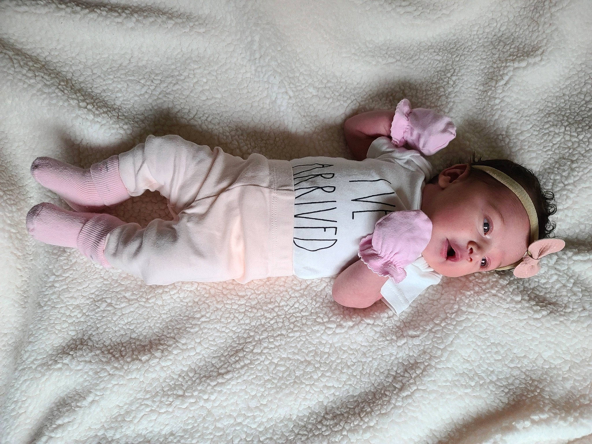 Madeline joined the competition — help win amazing prizes! arm, baby, baby_products, baby_sleeping, baby_toddler_clothing, cheek, child, comfort, eye, hand, head, linens, mammal, pattern, person, pink, product, room, skin, sleeve