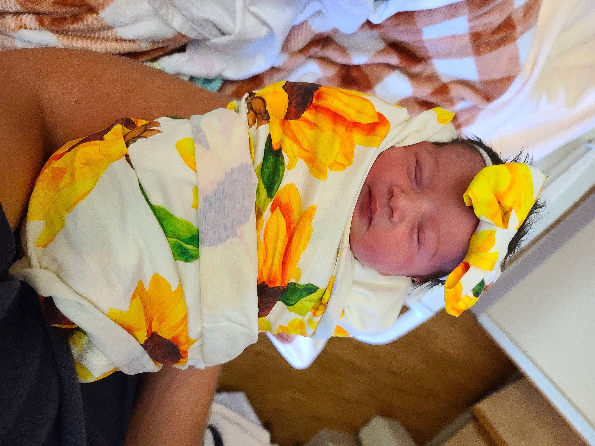 Madeline joined the competition — help win amazing prizes! baby, baby_toddler_clothing, child, comfort, event, flower, fun, happy, headwear, human_leg, linens, nail, orange, person, petal, plant, room, skin, thigh, toddler