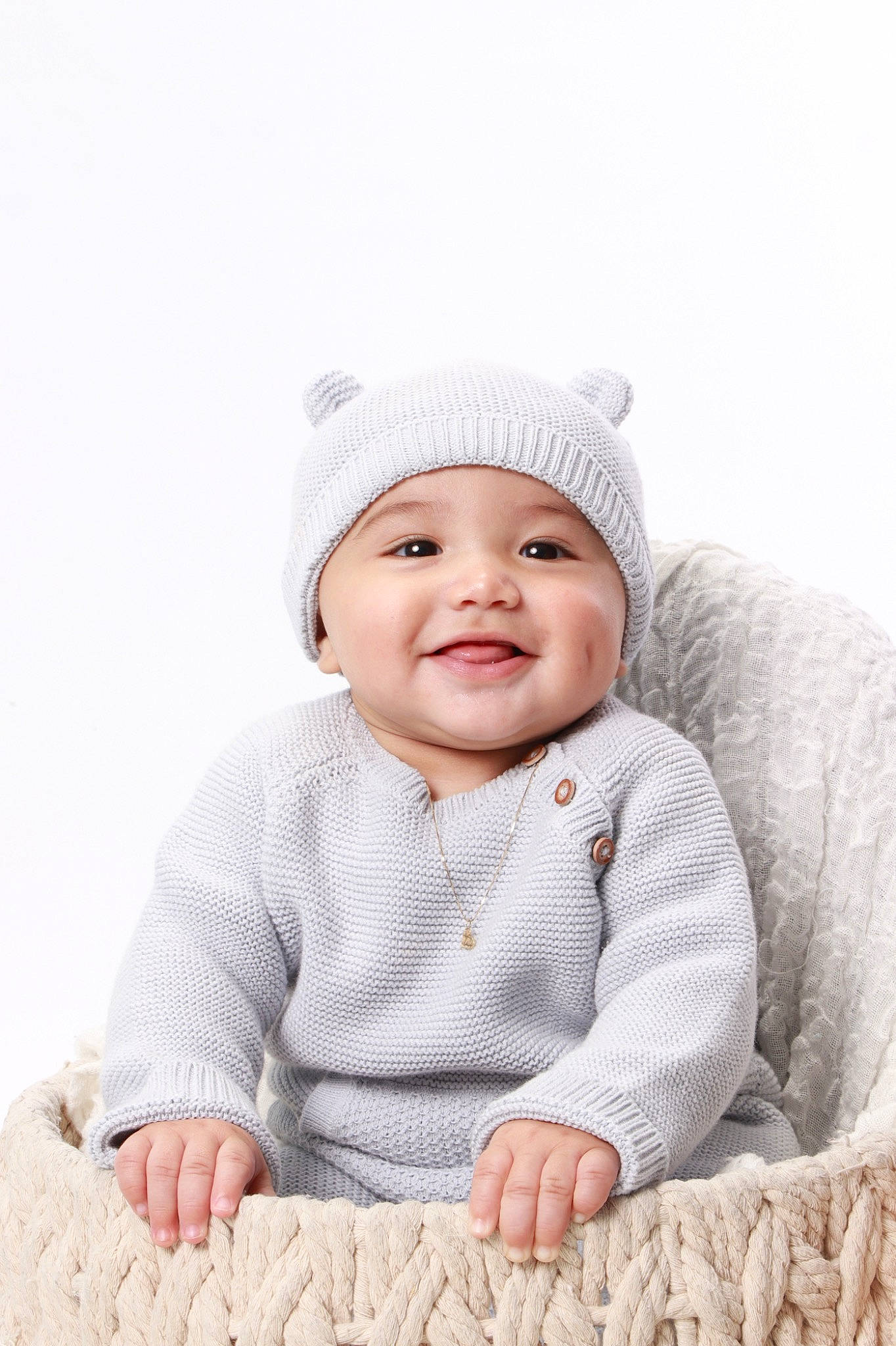 Jordyn joined the competition — help win amazing prizes! baby, baby_toddler_clothing, beanie, cap, child, comfort, fashion_accessory, flash_photography, happy, headgear, headwear, joy, laugh, outerwear, pattern, person, photograph, portrait_photography, sitting, skin