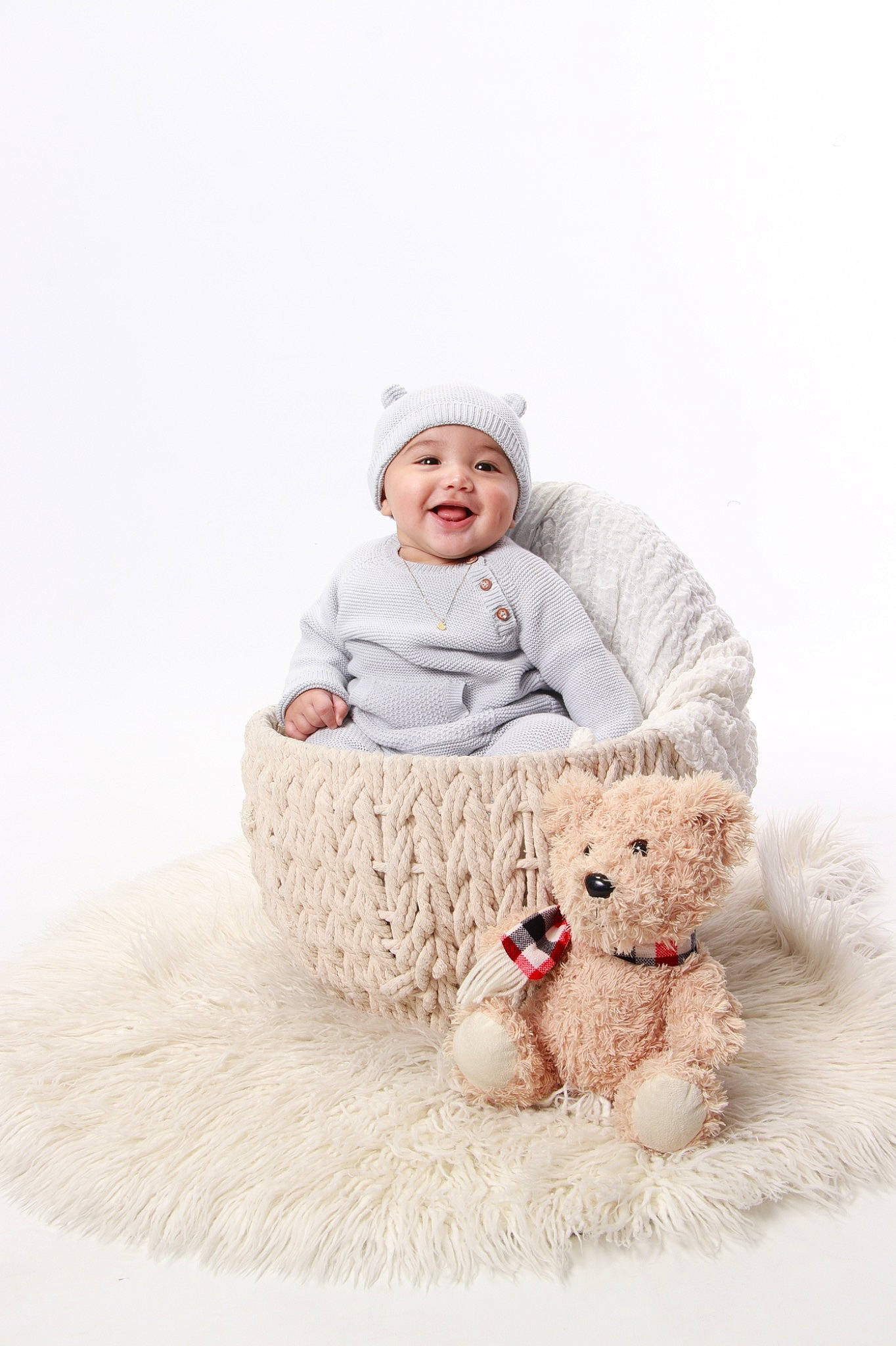 Jordyn joined the competition — help win amazing prizes! baby, baby_sleeping, baby_toddler_clothing, beanie, child, comfort, companion_dog, face, freezing, fur, happy, headwear, joy, linens, person, sitting, sleeve, smile, stuffed_toy, teddy_bear