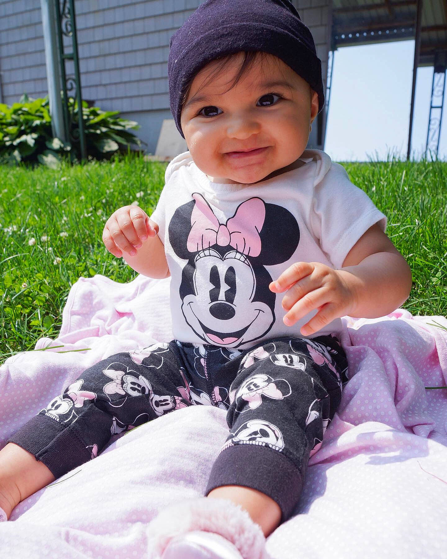 Sophia Grace joined the competition — help win amazing prizes! baby, baby_toddler_clothing, black_hair, cheek, child, cool, grass, head, joy, leg, panda, person, pink, plant, sitting, skin, smile, t_shirt, toddler