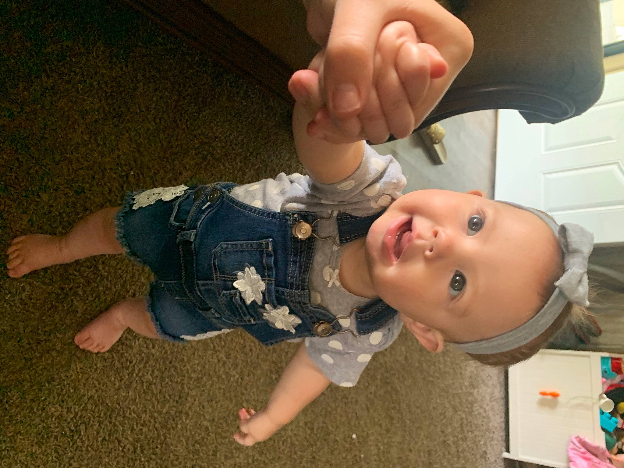 Londyn joined the competition — help win amazing prizes! baby, baby_toddler_clothing, cheek, eye, finger, fun, gesture, hand, happy, head, human_body, joint, mouth, nail, nose, person, skin, sleeve, smile, thumb