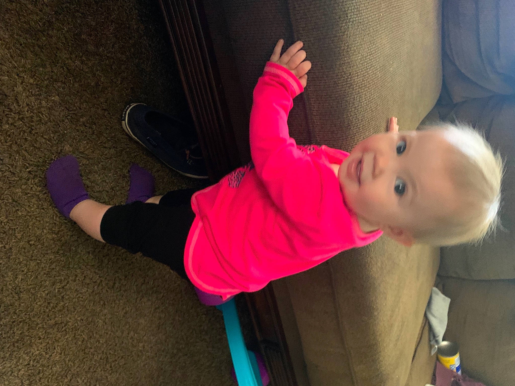 Londyn is registered to the contest to win money with this photo: active_pants, baby_toddler_clothing, child, comfort, electric_blue, floor, flooring, fun, happy, human_leg, knee, leg, magenta, person, pink, smile, sneakers, sportswear, tire, toddler