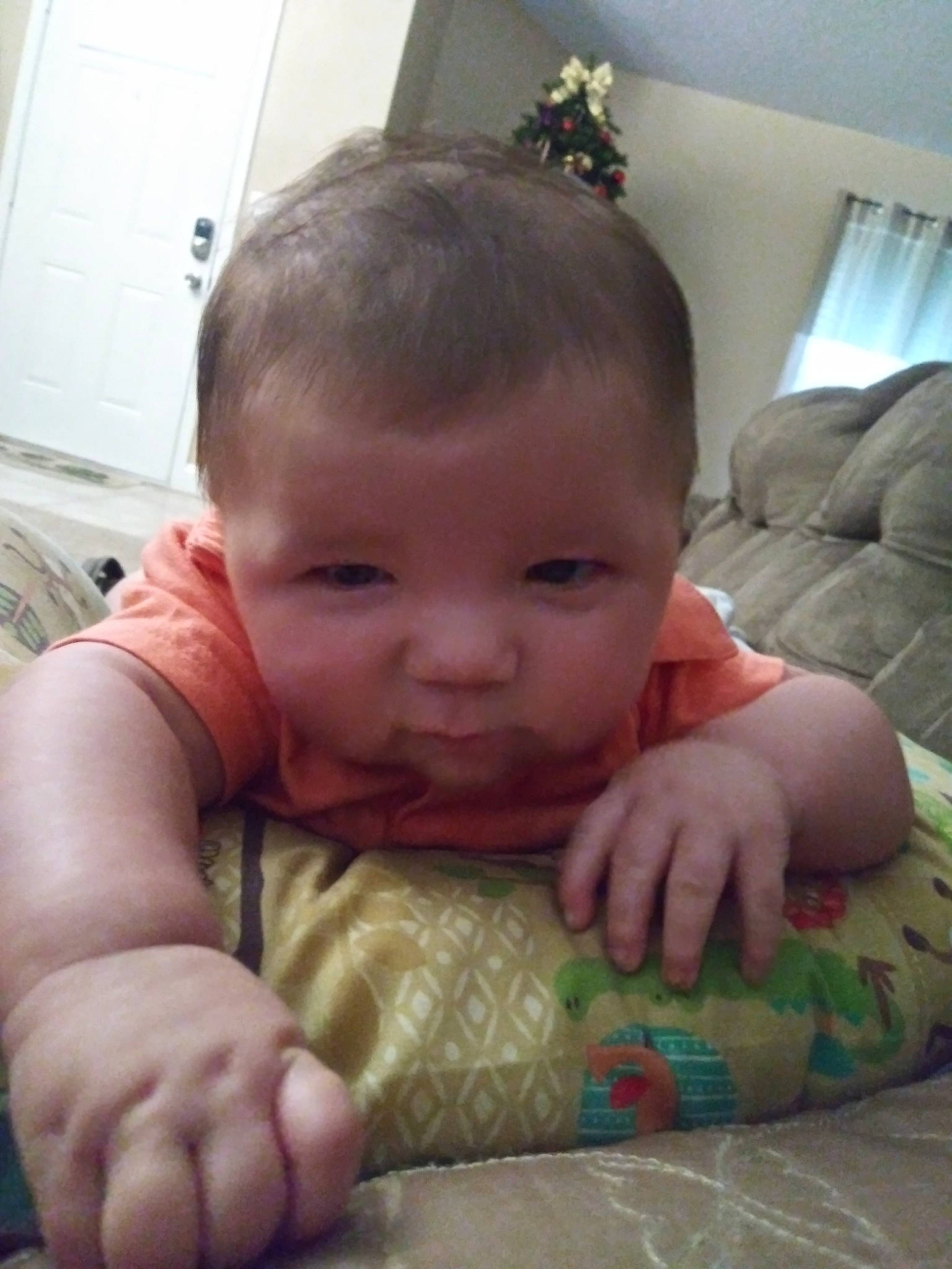 Terrance is registered to the contest to win money with this photo: arm, cheek, child, day, ear, eye, face, finger, forehead, girl, hand, head, infant, leg, mouth, nose, person, play, product, skin