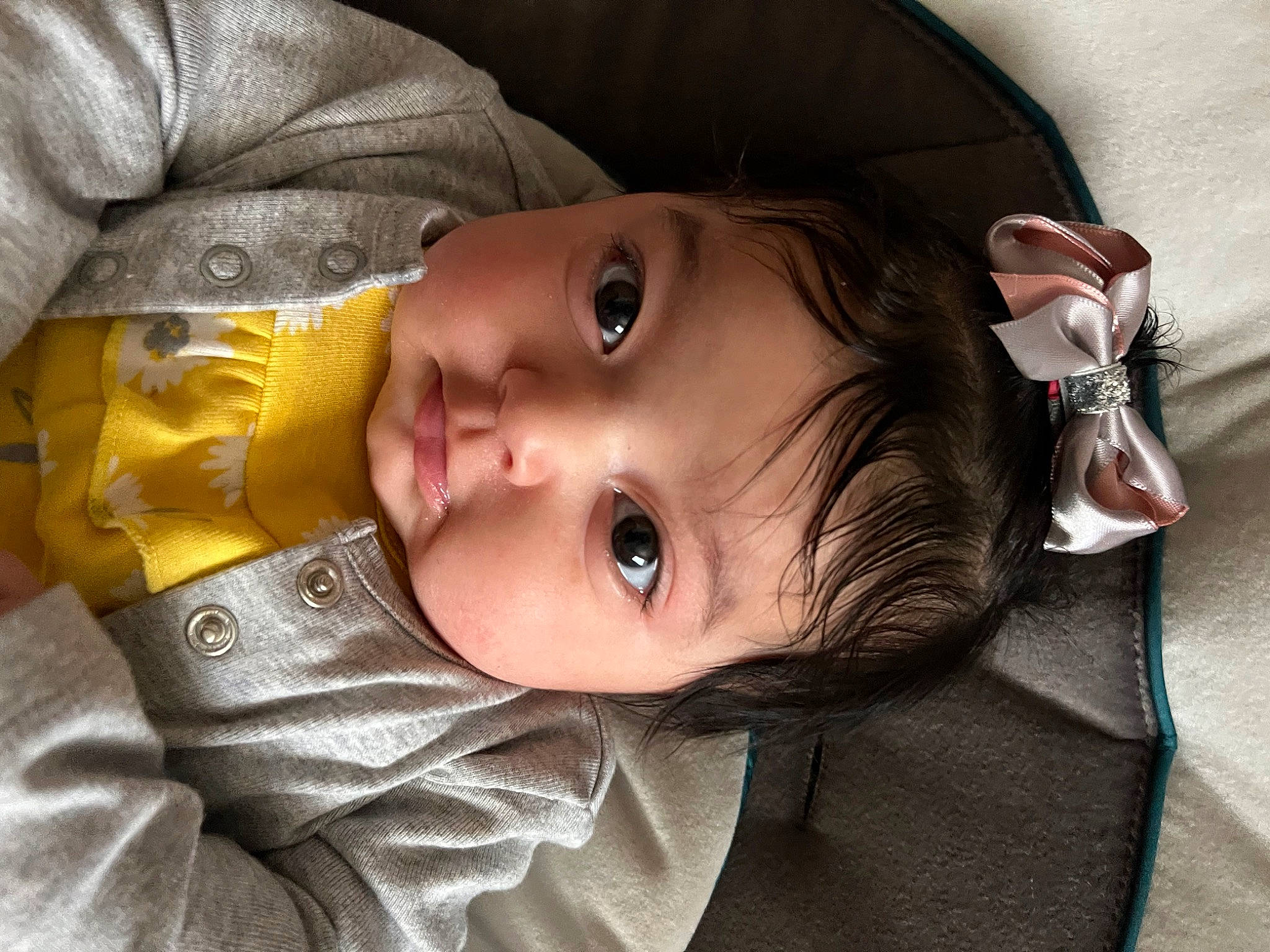 Lailani is registered to the contest to win money with this photo: baby, baby_toddler_clothing, cheek, child, chin, close_up, ear, eye, eyebrow, eyelash, headgear, iris, lip, mammal, mouth, nose, person, skin, smile, toddler