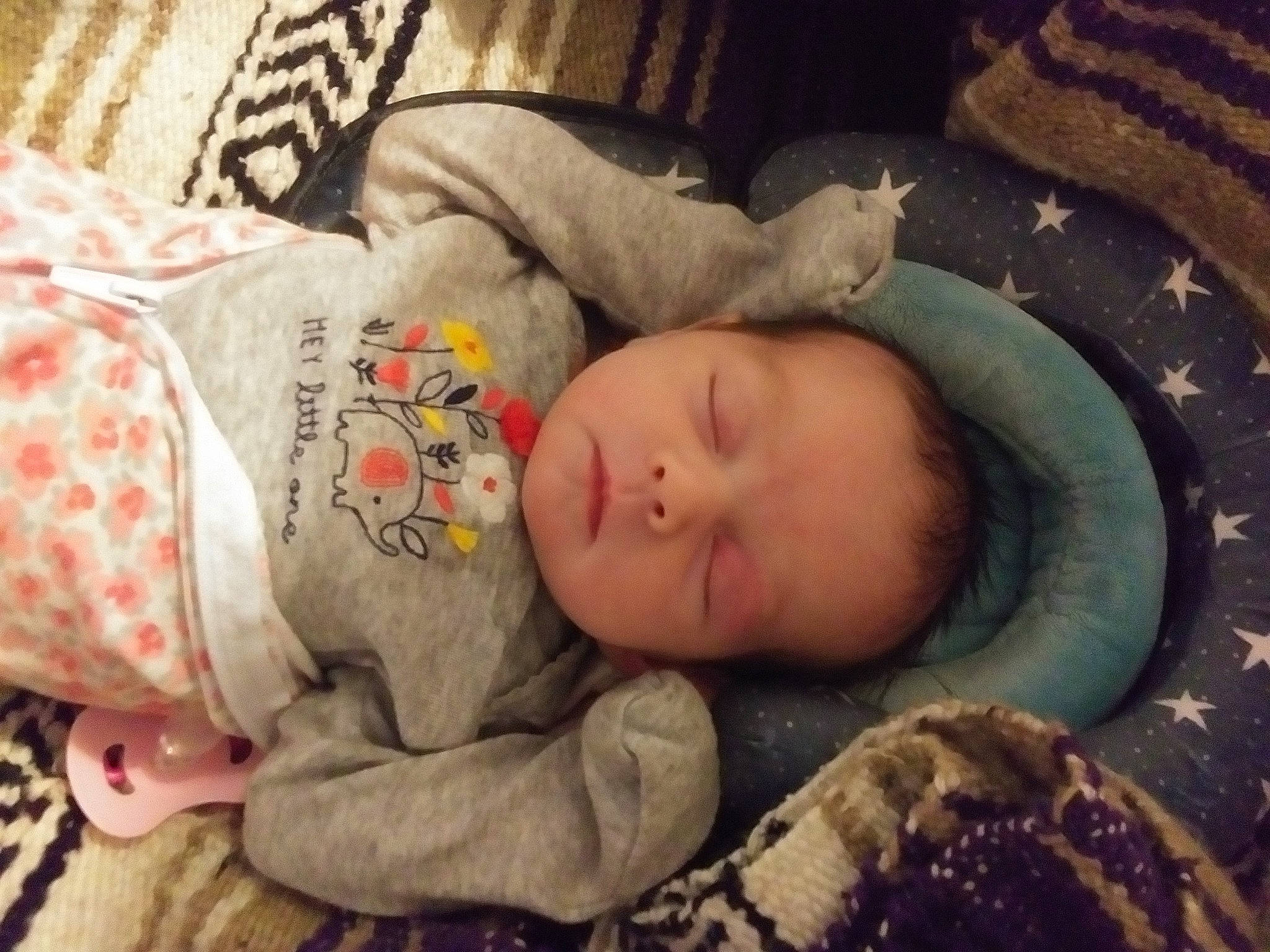 Lilith is registered to the contest to win money with this photo: baby, baby_sleeping, baby_toddler_clothing, bedding, bedtime, cheek, child, comfort, fur, head, linens, mammal, nap, pattern, person, room, sitting, skin, sleep, sleeve