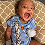 Elijah joined the competition — help win amazing prizes! baby, babylaughing, blade, clothing, dagger, face, glove, happy, head, knife, person, photography, portrait, weapon, yawning