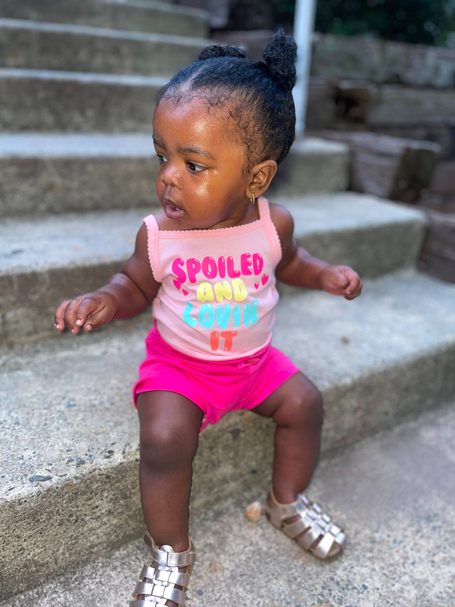 Bailei is registered to the contest to win money with this photo: adaptation, baby_toddler_clothing, black_hair, cheek, chin, eye, face, hair, happy, head, lip, magenta, person, pink, plant, sandal, skin, sneakers, thigh, toddler