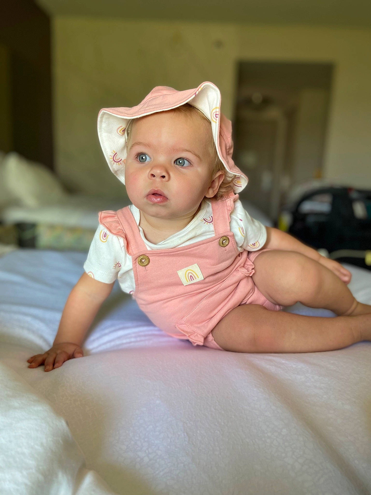 Jazzlynn joined the competition — help win amazing prizes! baby, baby_toddler_clothing, cheek, child, comfort, dress, eye, fashion_accessory, flash_photography, flooring, fun, happy, hat, iris, linens, person, portrait_photography, sitting, skin, sleeve