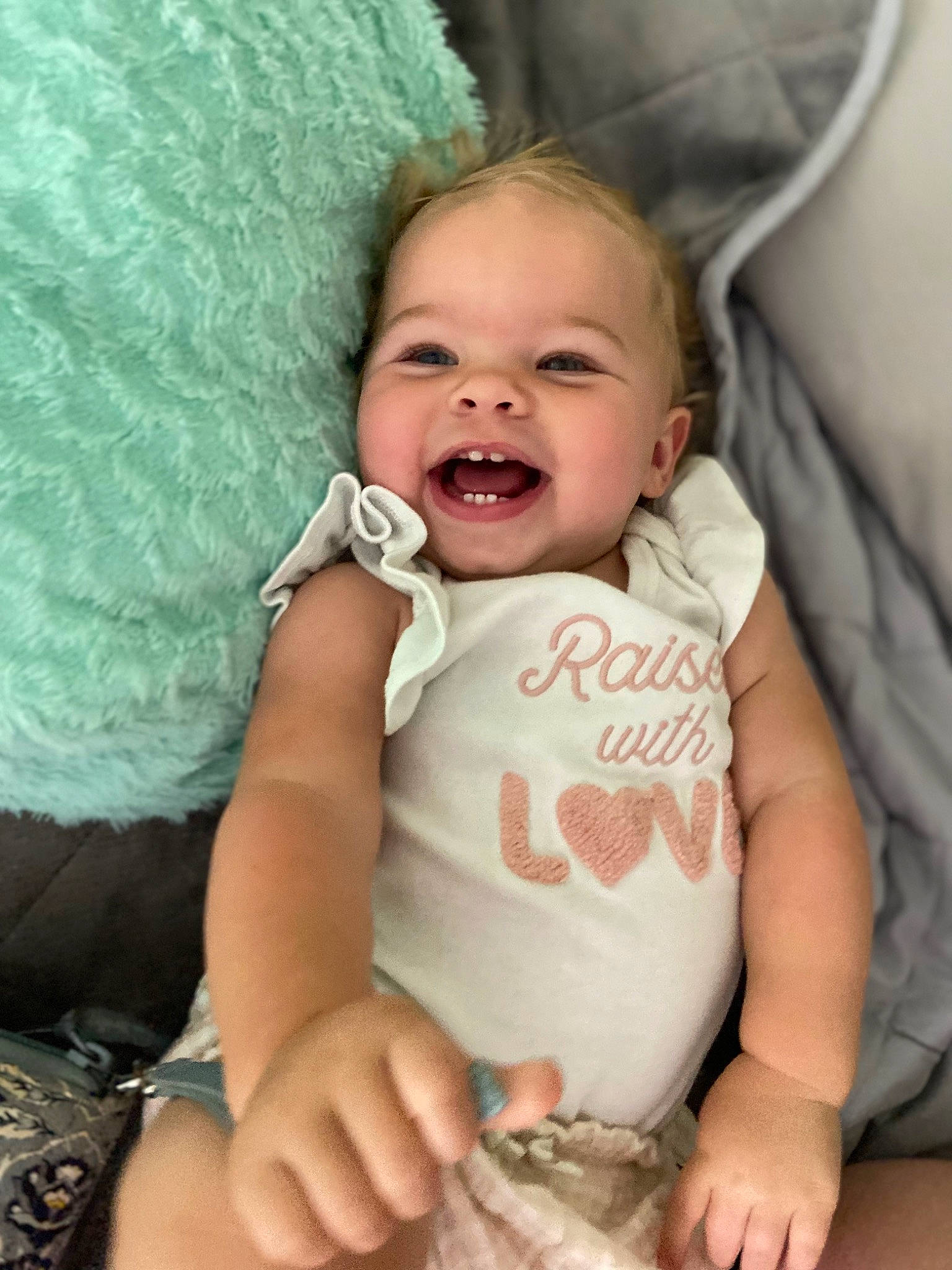 Jazzlynn is registered to the contest to win money with this photo: baby, baby_products, baby_toddler_clothing, cheek, child, comfort, eye, happy, head, iris, linens, mammal, mouth, pattern, person, sitting, skin, sleeve, smile, textile