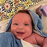 baby, smile, towel, blue, blanket, pattern, happy, face, child, skin, head, eyes, newborn, infant, closeup, cute, indoor, portrait, babycare, fresh