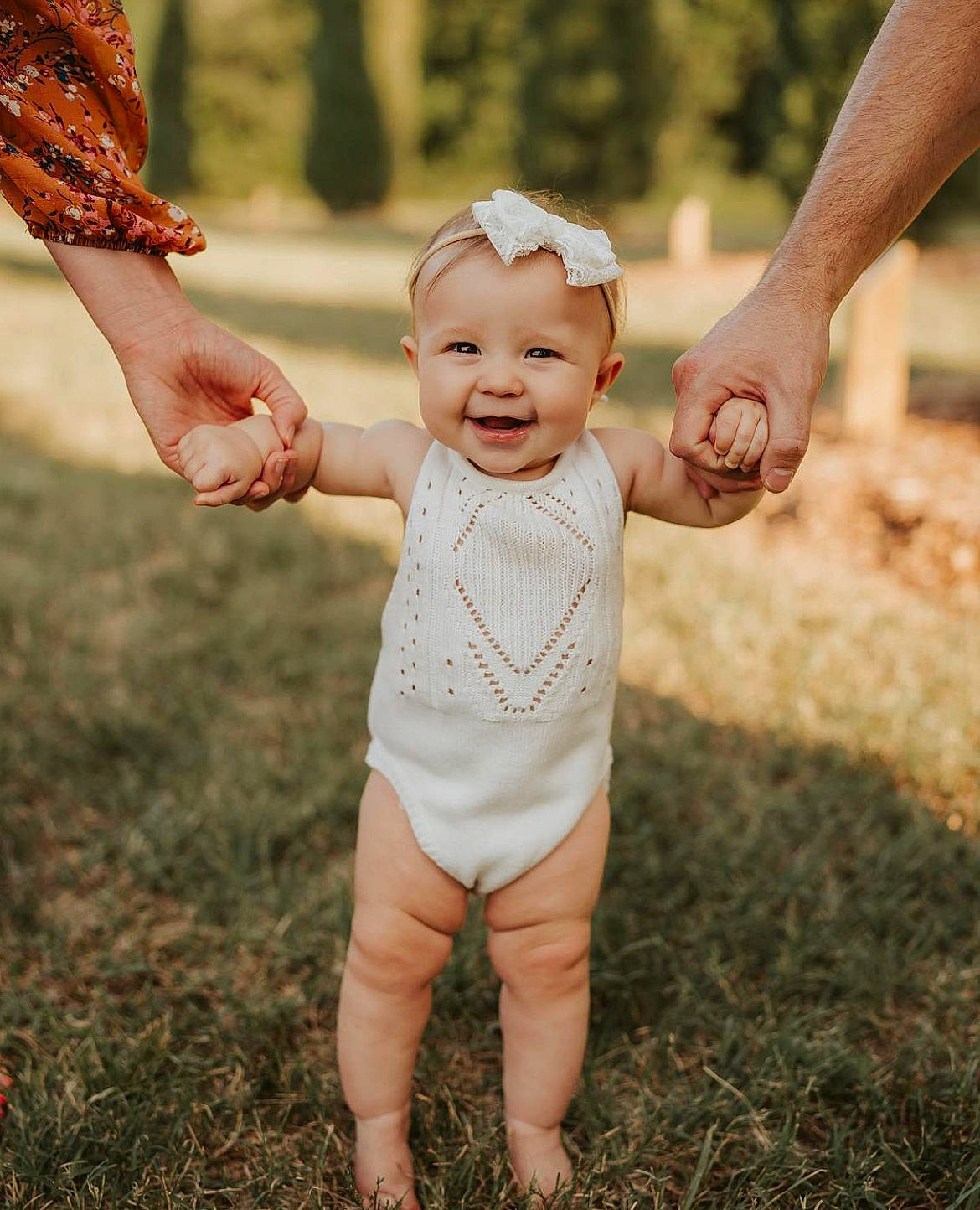 Camryn joined the competition — help win amazing prizes! baby, baby_toddler_clothing, child, eye, finger, flash_photography, fun, gesture, grass, hand, happy, joy, leisure, people_in_nature, person, plant, skin, smile, standing, sunlight