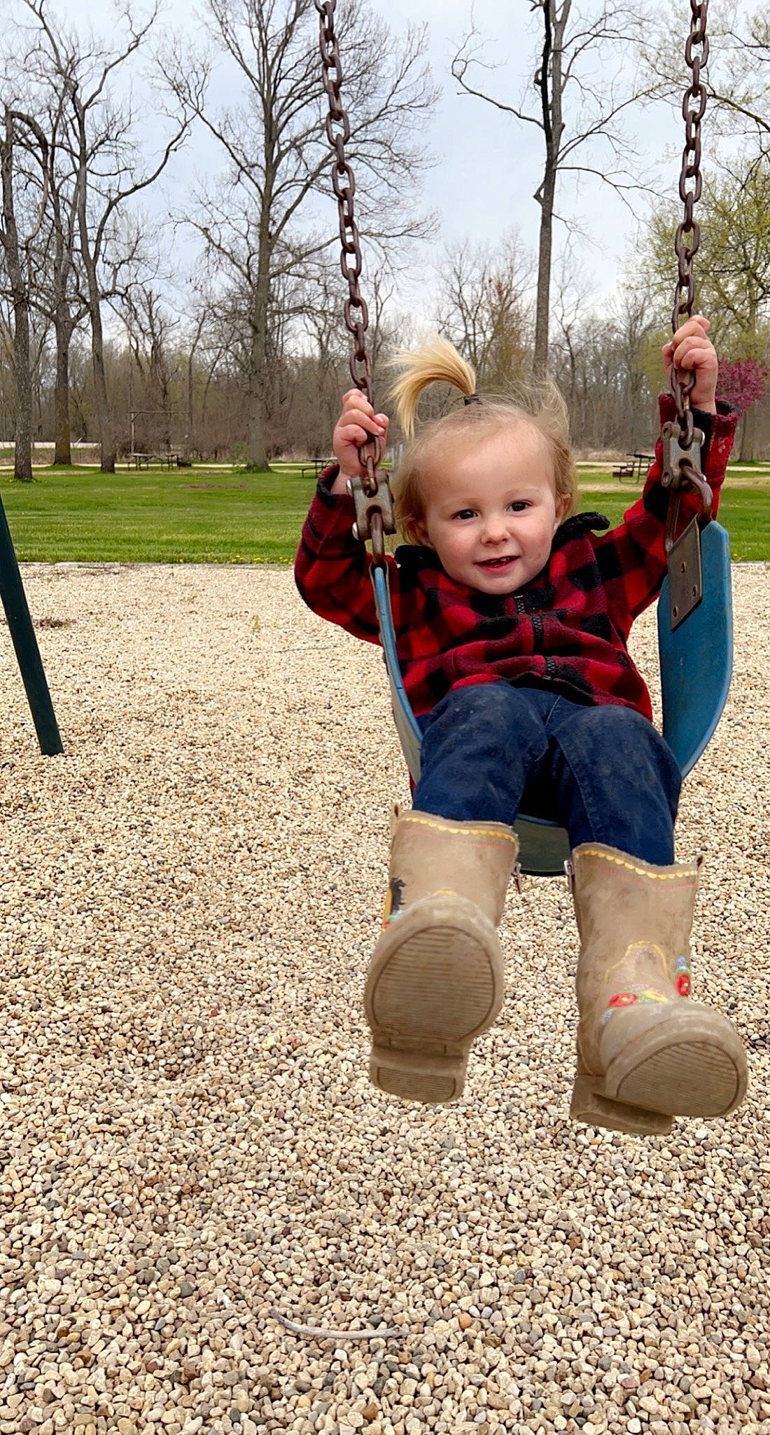 Anastasia is registered to the contest to win money with this photo: baby, baby_toddler_clothing, ball, eye, facial_expression, finger, gesture, grass, happy, human_body, joy, leisure, outdoor_play_equipment, people_in_nature, person, plant, recreation, sky, smile, swing