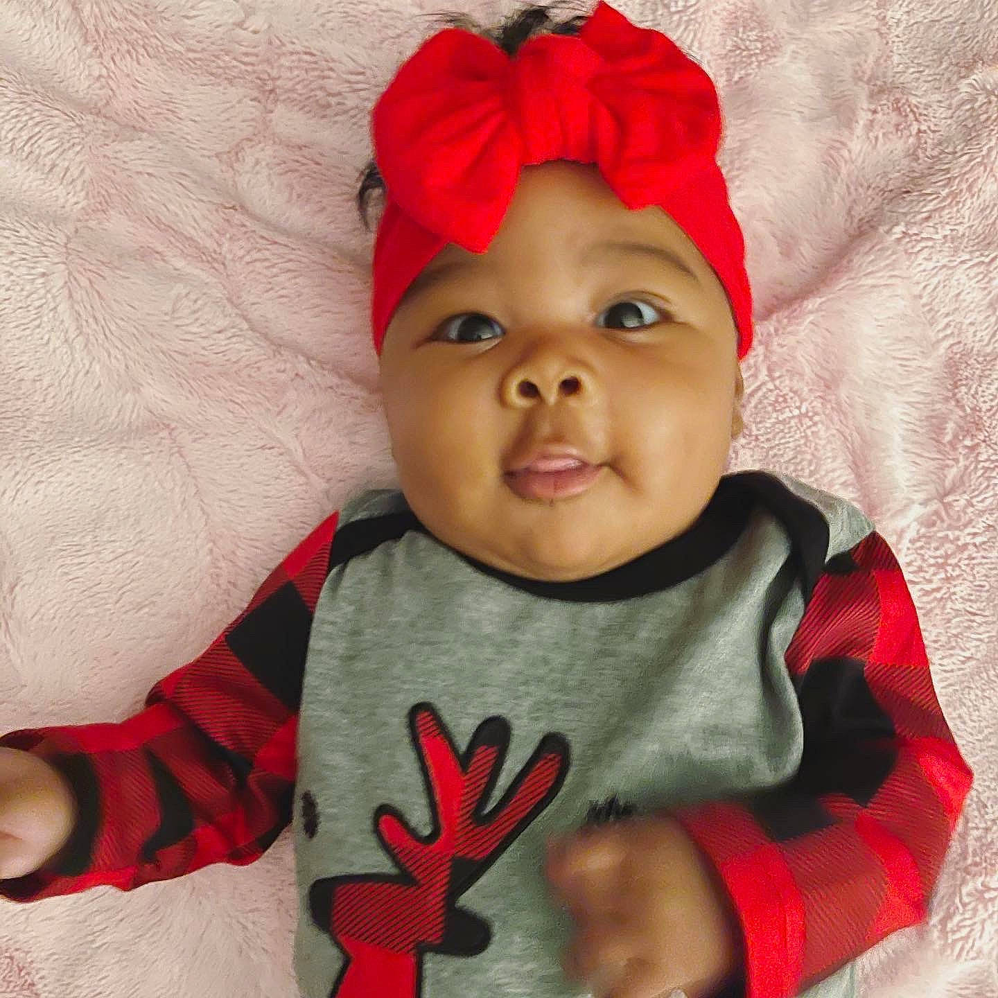 Kamiyah is registered to the contest to win money with this photo: arm, blue, cap, cheek, clothing, eye, face, finger, fun, green, hairstyle, head, headwear, human, human_body, lip, people, person, product, skin