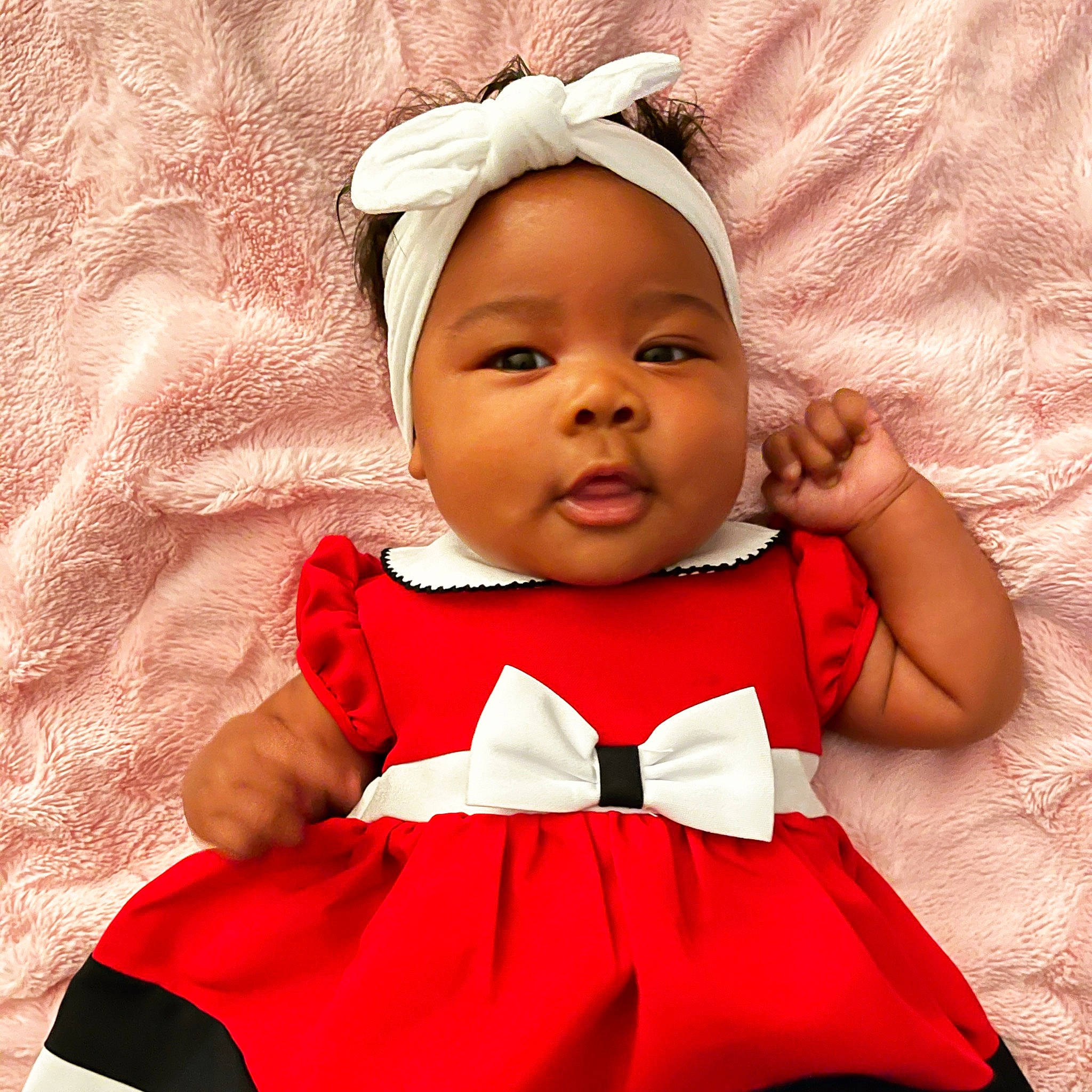 Kamiyah joined the competition — help win amazing prizes! baby, baby_toddler_clothing, child_model, costume, costume_accessory, day_dress, embellishment, hair_accessory, headband, headgear, headpiece, headwear, one_piece_garment, person, pink, red, textile, toddler