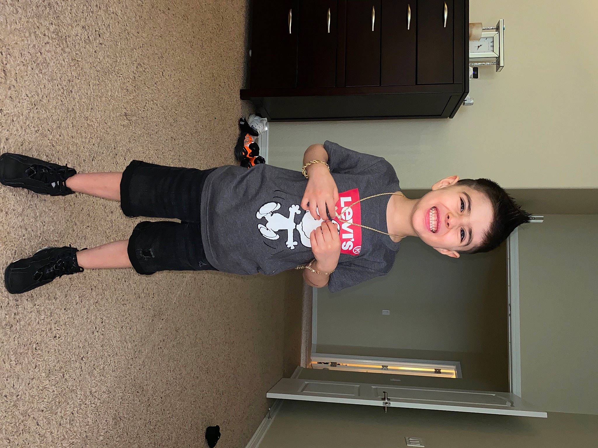 Jeremiah joined the competition — help win amazing prizes! display_device, elbow, fun, human_leg, joint, joy, knee, laptop, outdoor_shoe, person, personal_computer, recreation, room, smile, sportswear, t_shirt, thigh, walking_shoe, wall