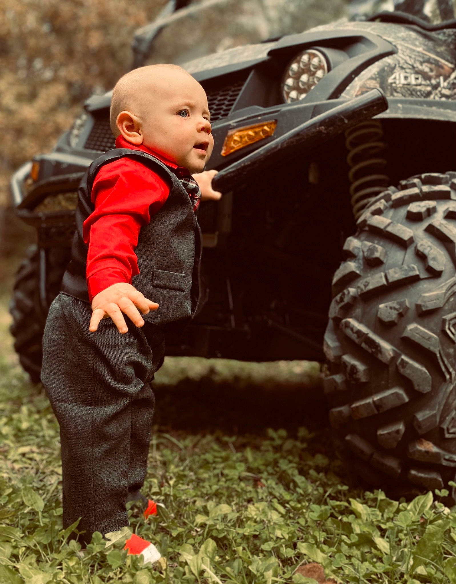 Remington joined the competition — help win amazing prizes! automotive_design, automotive_tire, baby_toddler_clothing, bumper, fender, grass, jacket, leaf, motor_vehicle, people, people_in_nature, person, rim, synthetic_rubber, tire, tire_care, toddler, tread, vehicle, wheel
