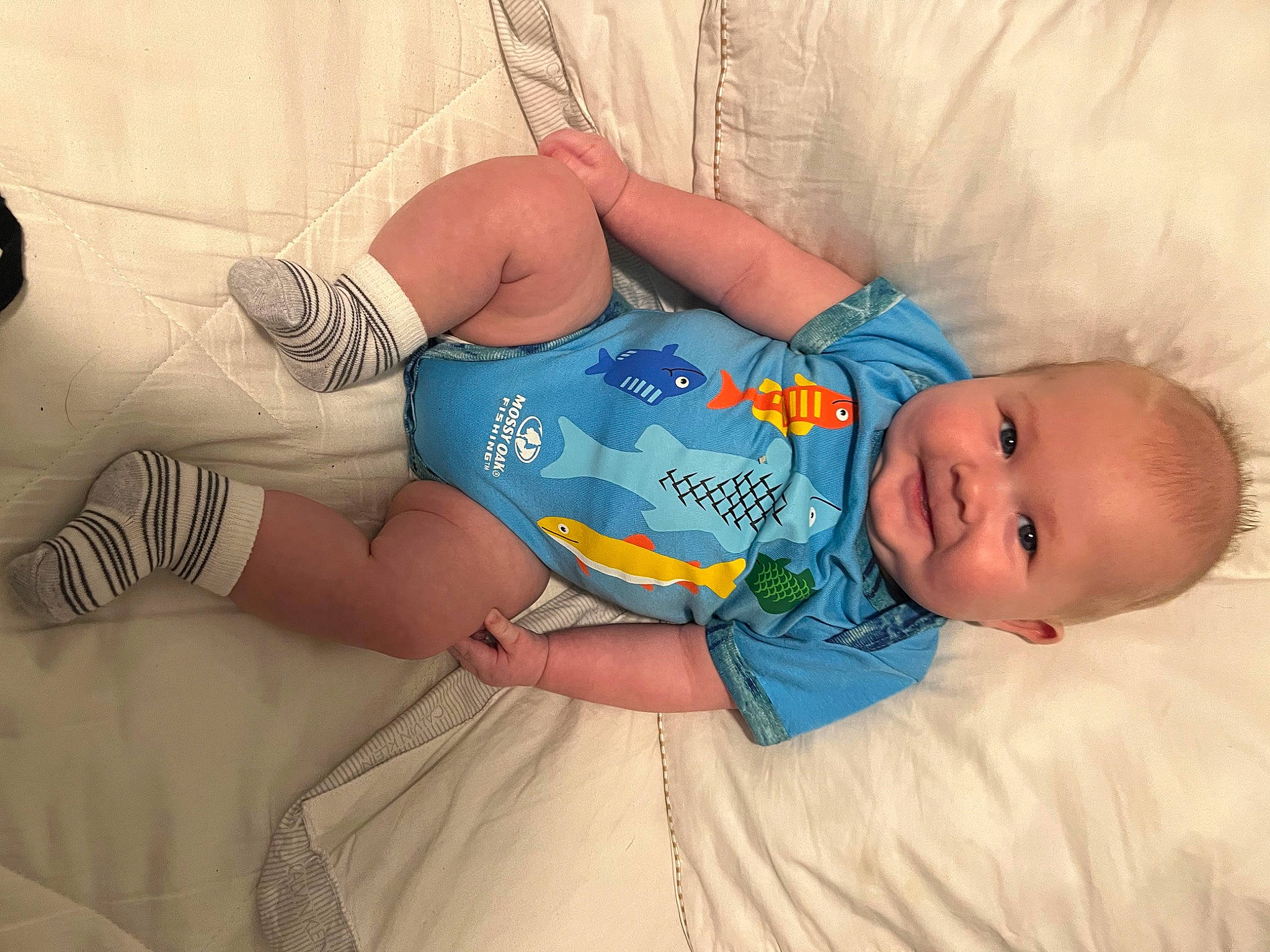 Maverick joined the competition — help win amazing prizes! arm, baby, baby_toddler_clothing, comfort, elbow, eye, finger, hand, head, human_body, knee, mammal, mouth, muscle, person, skin, smile, textile, thigh, toddler