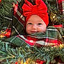 Poppy is registered to the contest to win money with this photo: baby, child, christmas_lights, closeup, cozy, cute, face, festive, greenery, happy, headband, holiday, indoors, infant, plaid_blanket, portrait, red_bow, smiling, warm, wrapped
