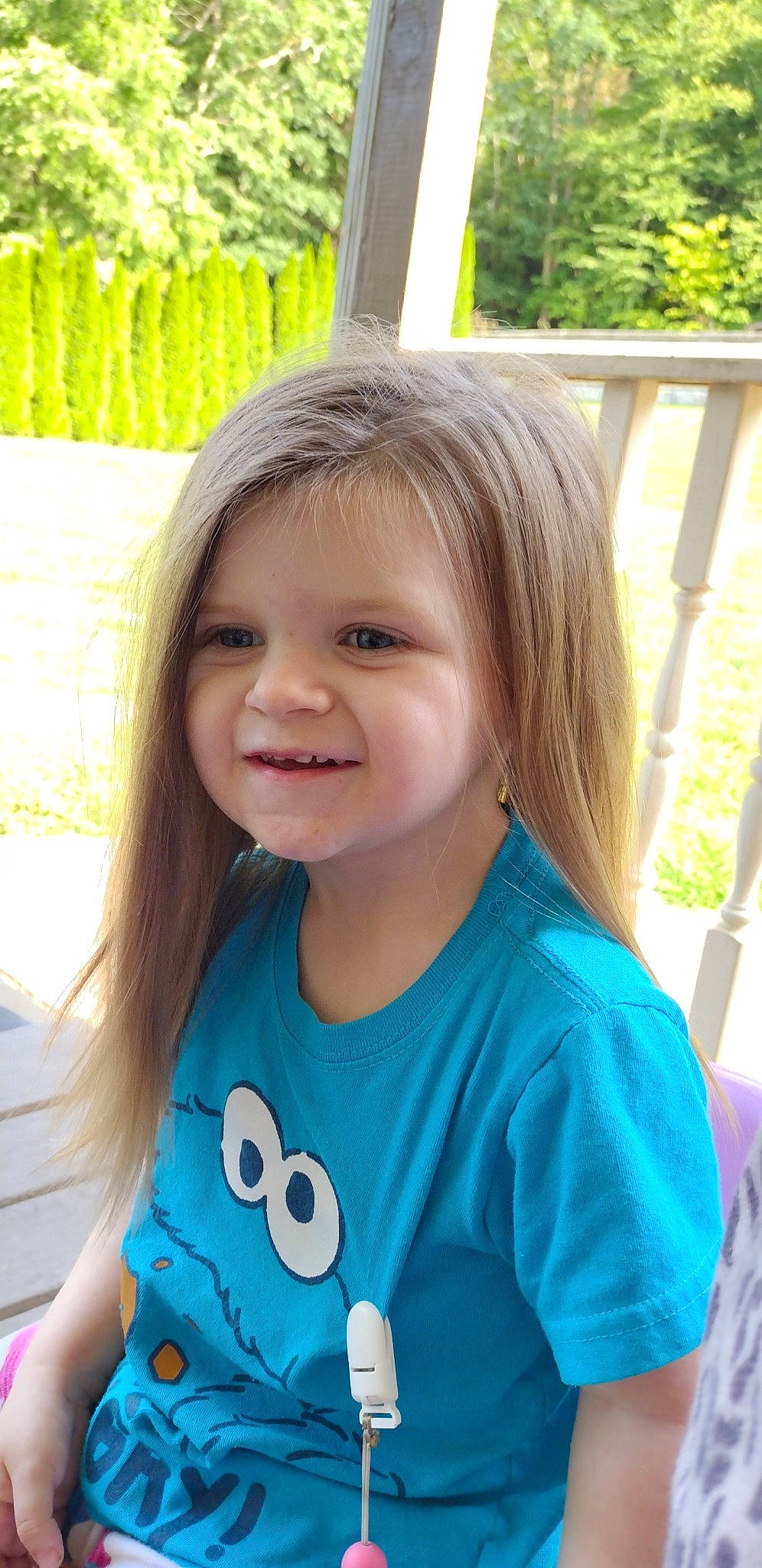 Noelle is registered to the contest to win money with this photo: baby_toddler_clothing, child, cool, facial_expression, fun, grass, green, hairstyle, happy, human, iris, joy, leaf, leisure, neck, organ, person, shoulder, skin, sleeve