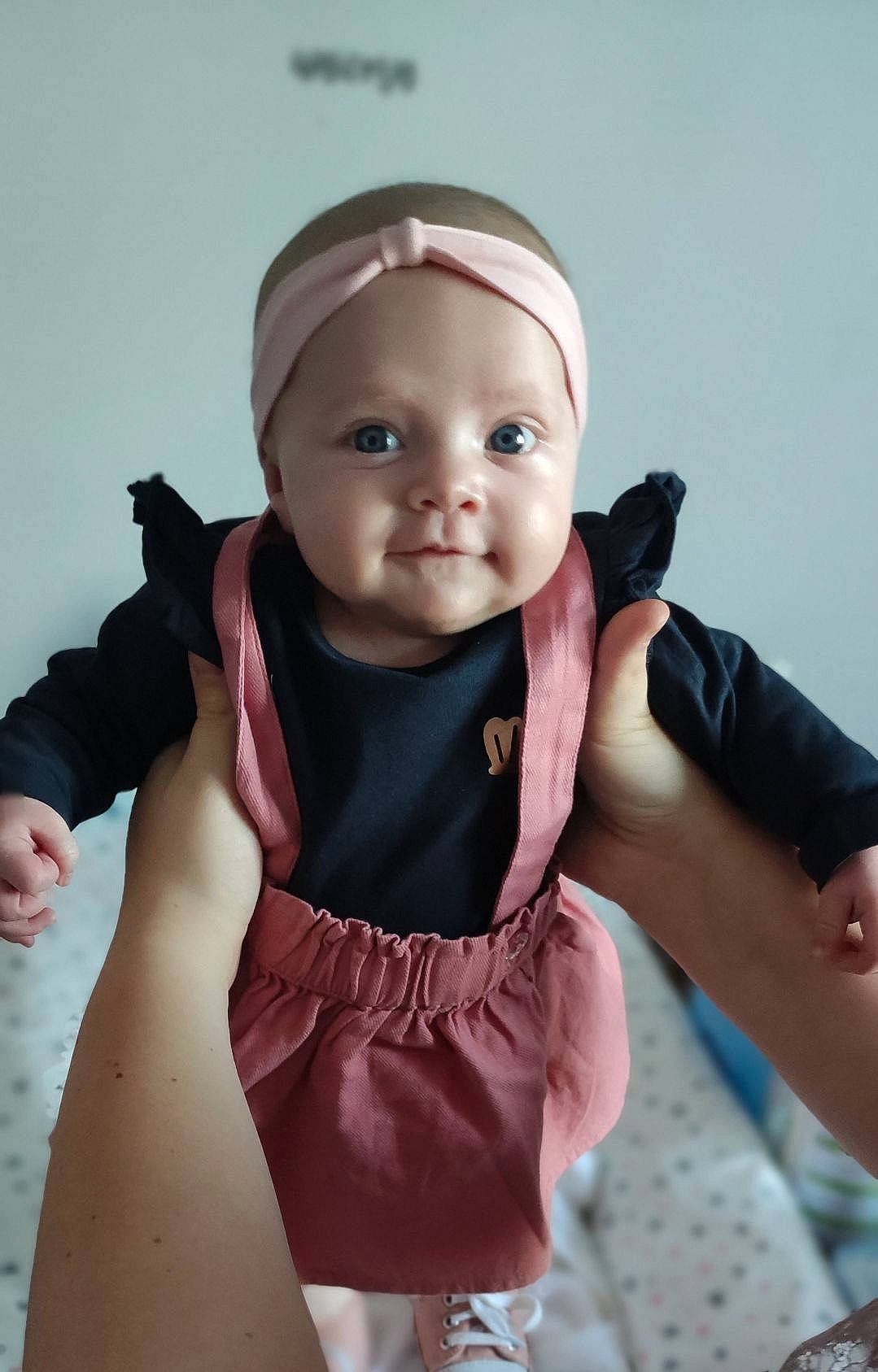 Lily participe au concours pour gagner de l'argent avec cette photo : baby, baby_products, baby_toddler_clothing, cap, cheek, child, dress, fashion_accessory, finger, hand, happy, headwear, iris, magenta, pattern, person, pink, purple, skin, sleeve