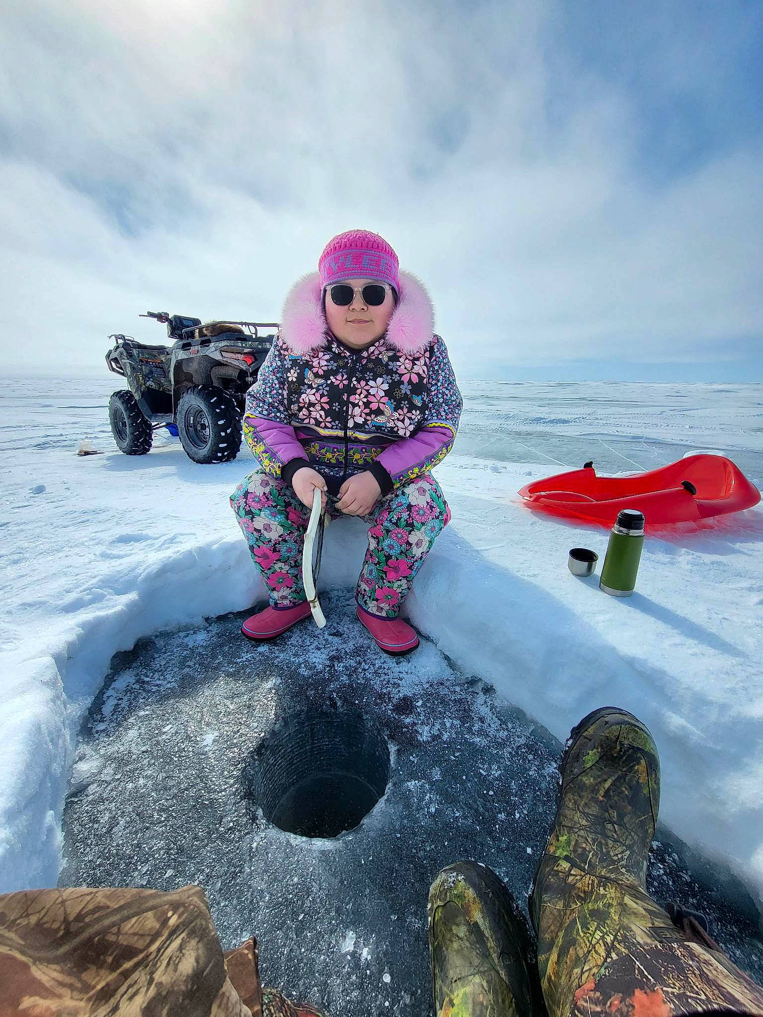 Kyleen is registered to the contest to win money with this photo: automotive_tire, cloud, eyewear, freezing, fun, glacial_landform, goggles, headwear, ice_cap, landscape, leisure, outdoor_recreation, people_in_nature, person, recreation, sky, snow, sunglasses, tire, travel