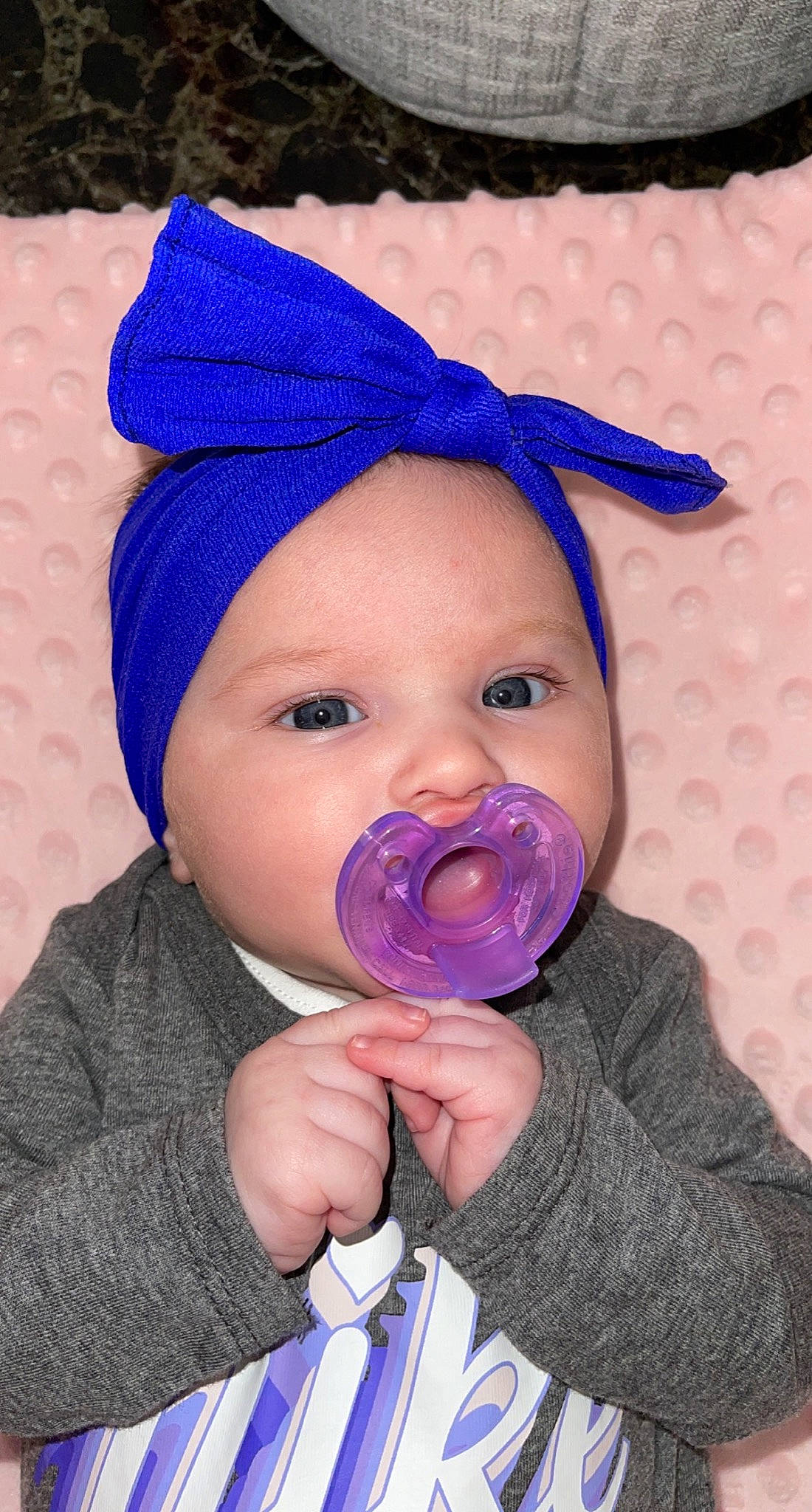 Kinzley joined the competition — help win amazing prizes! baby, baby_toddler_clothing, blue, cap, cheek, clothing, costume_hat, electric_blue, finger, hand, hat, headwear, knit_cap, magenta, nose, outerwear, person, pink, purple, toddler