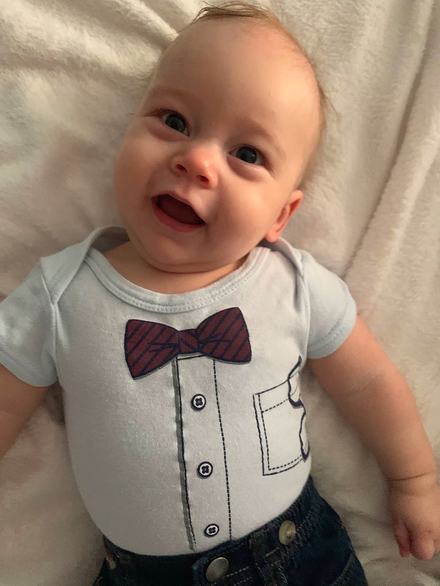 Zayne joined the competition — help win amazing prizes! baby, baby_products, baby_toddler_clothing, bow_tie, cheek, child, chin, face, facial_expression, head, outerwear, person, product, skin, sleeve, smile, standing, t_shirt, tie, toddler
