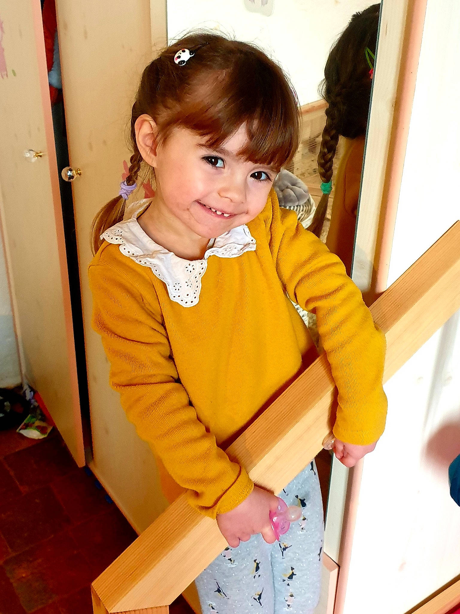 Gabrielle participe au concours pour gagner de l'argent avec cette photo : bangs, brown_hair, chair, elbow, finger, fun, happy, human_body, jacket, joy, neck, outerwear, person, shoulder, skin, sleeve, smile, standing, thigh, toddler