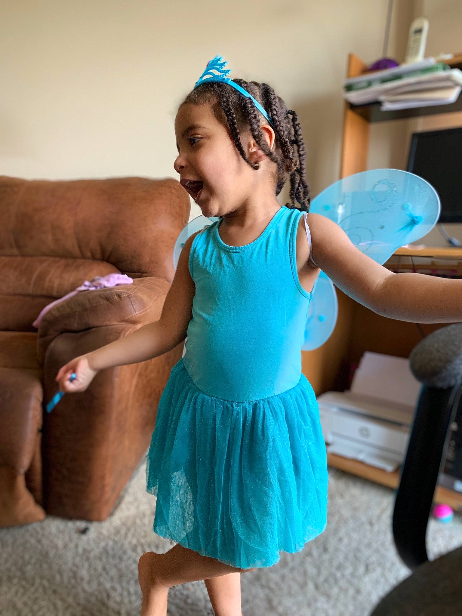 Egypt is registered to the contest to win money with this photo: blue, child, clothing, costume, dress, ear, fashion_accessory, finger, hair_accessory, headband, headgear, headpiece, neck, person, pink, play, toddler, turquoise