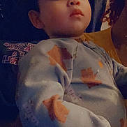 Milo joined the competition — help win amazing prizes! adult, baby, casual, child, close_up, cozy, curly_hair, cute, face, family, holding, indoor, onesie, patterned_clothing, person, portrait, soft_texture, thoughtful, toddler, warm_lighting