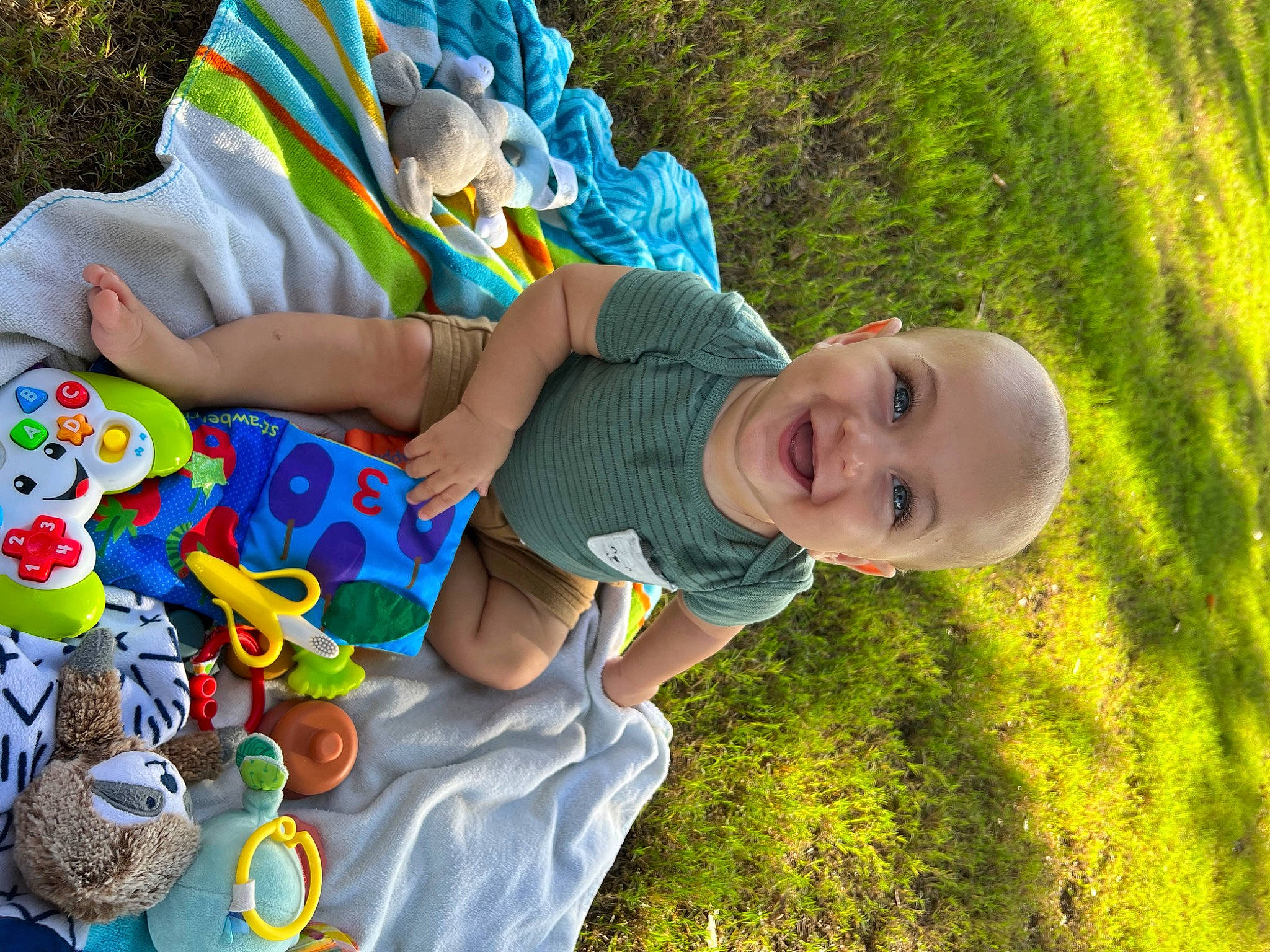 Bryson is registered to the contest to win money with this photo: adaptation, baby, baby_toddler_clothing, child, fun, grass, grass_family, happy, hat, human_body, joy, lawn, leaf, leisure, people_in_nature, person, plant, recreation, smile, sun_hat